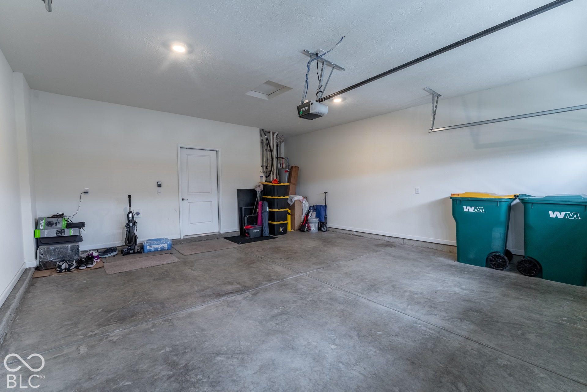 6432 Yuma, Whitestown, IN 46075 Spacious garage with a concrete floor, overhead lighting, and white walls
