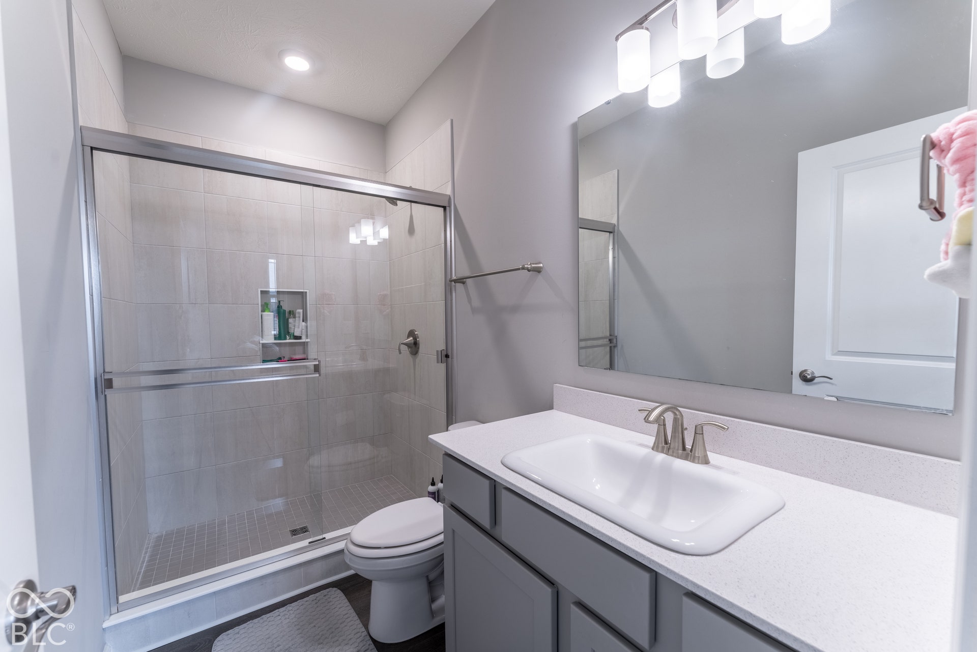 6432 Yuma, Whitestown, IN 46075 Glass-enclosed shower with tiled surround and integrated niche
