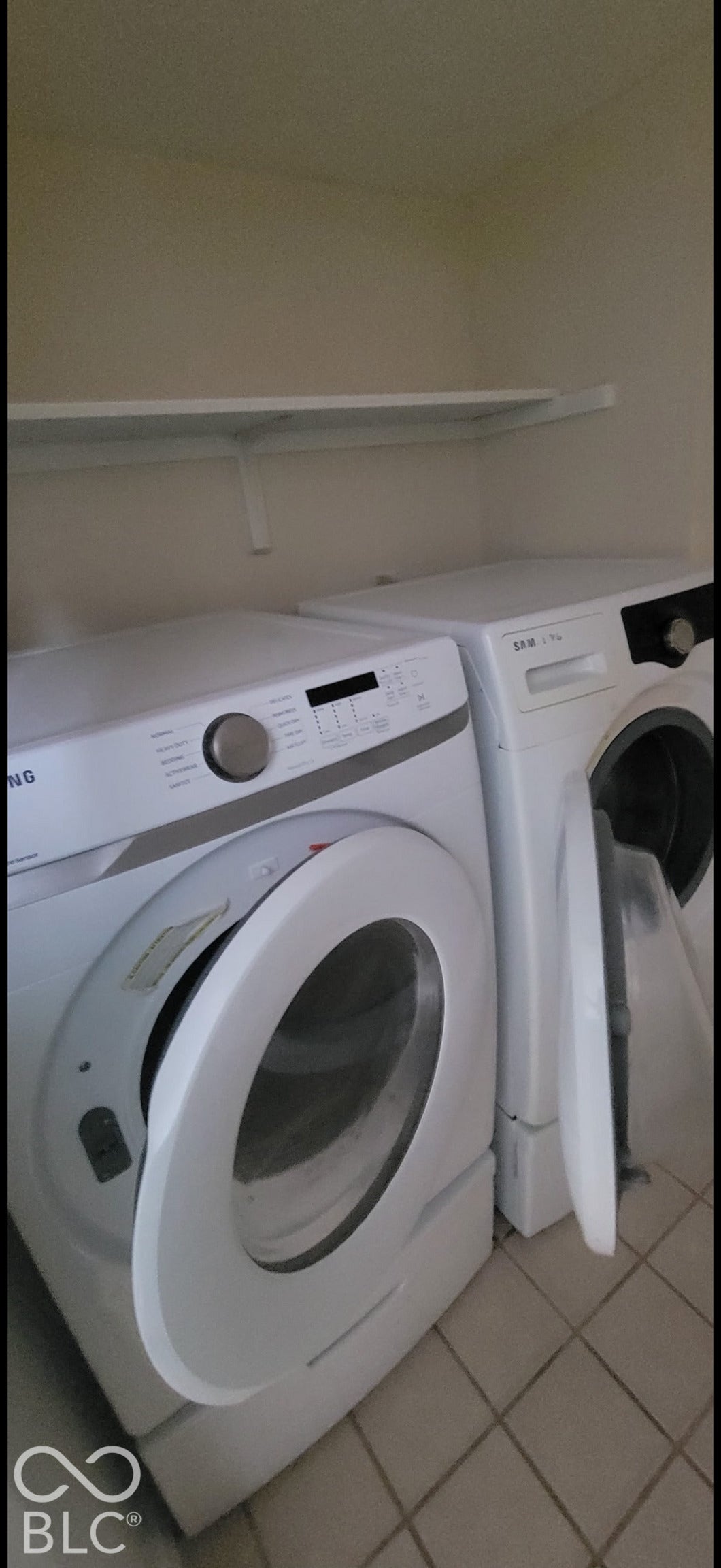 702 Coffee Tree, Indianapolis, IN 46224 Dedicated laundry space featuring a white shelf and tile flooring