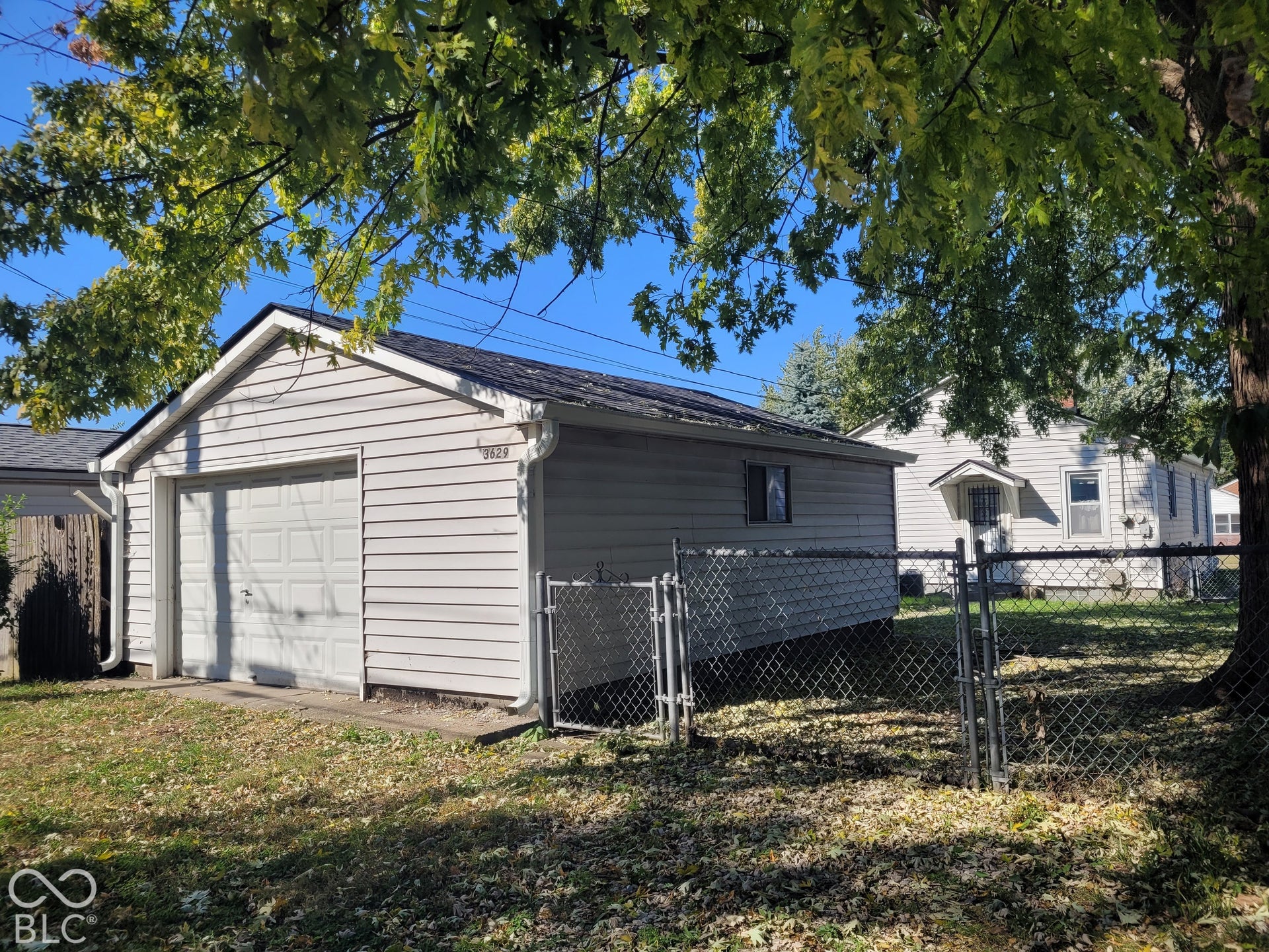 garage faces the alley - - - 1.5 spaces and room for storage !!!  Fully fenced rear yard !!!