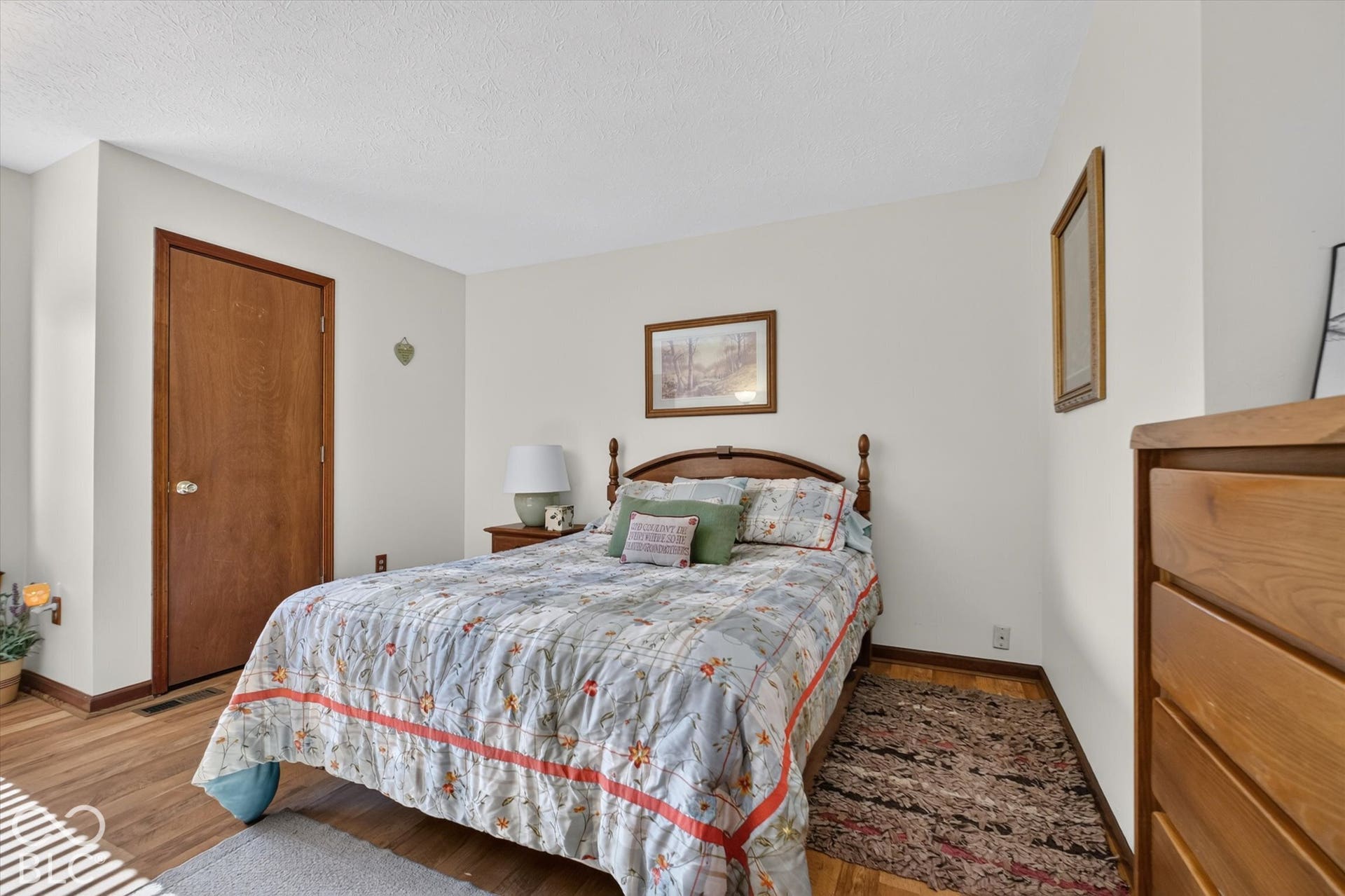 Wood-finish flooring with light-toned walls