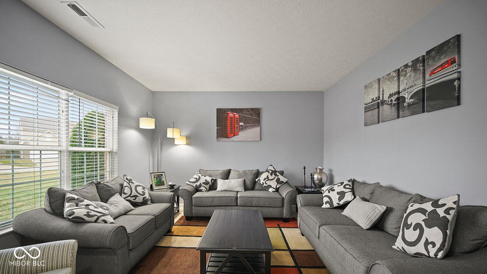 living area featuring visible vents