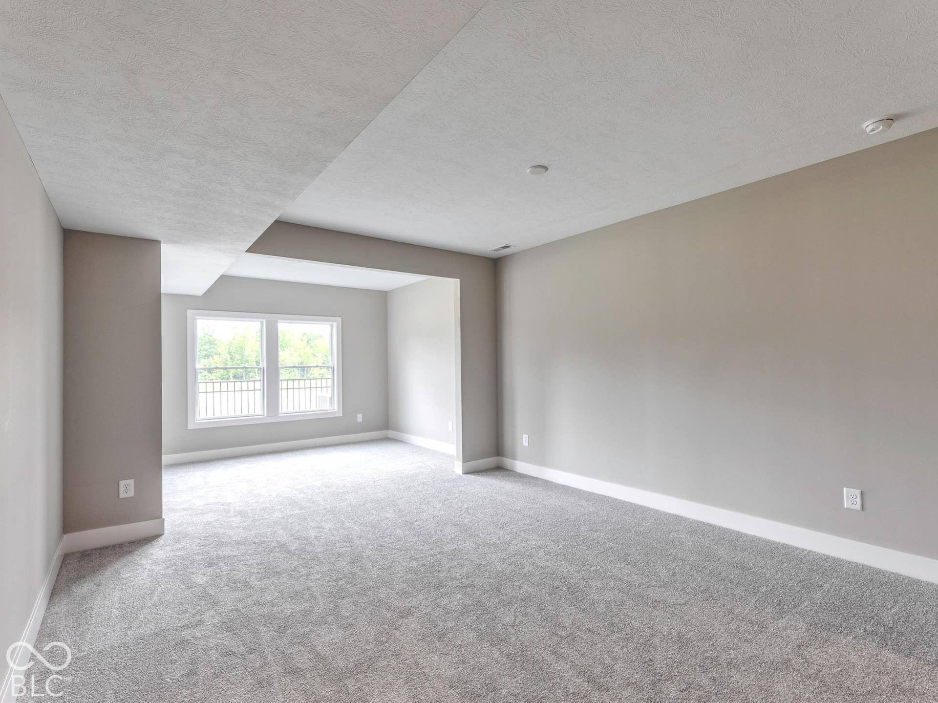 Basement - Bedroom 3 with sitting room.Photo shown is of a similar home/floor plan. Actual home may differ.