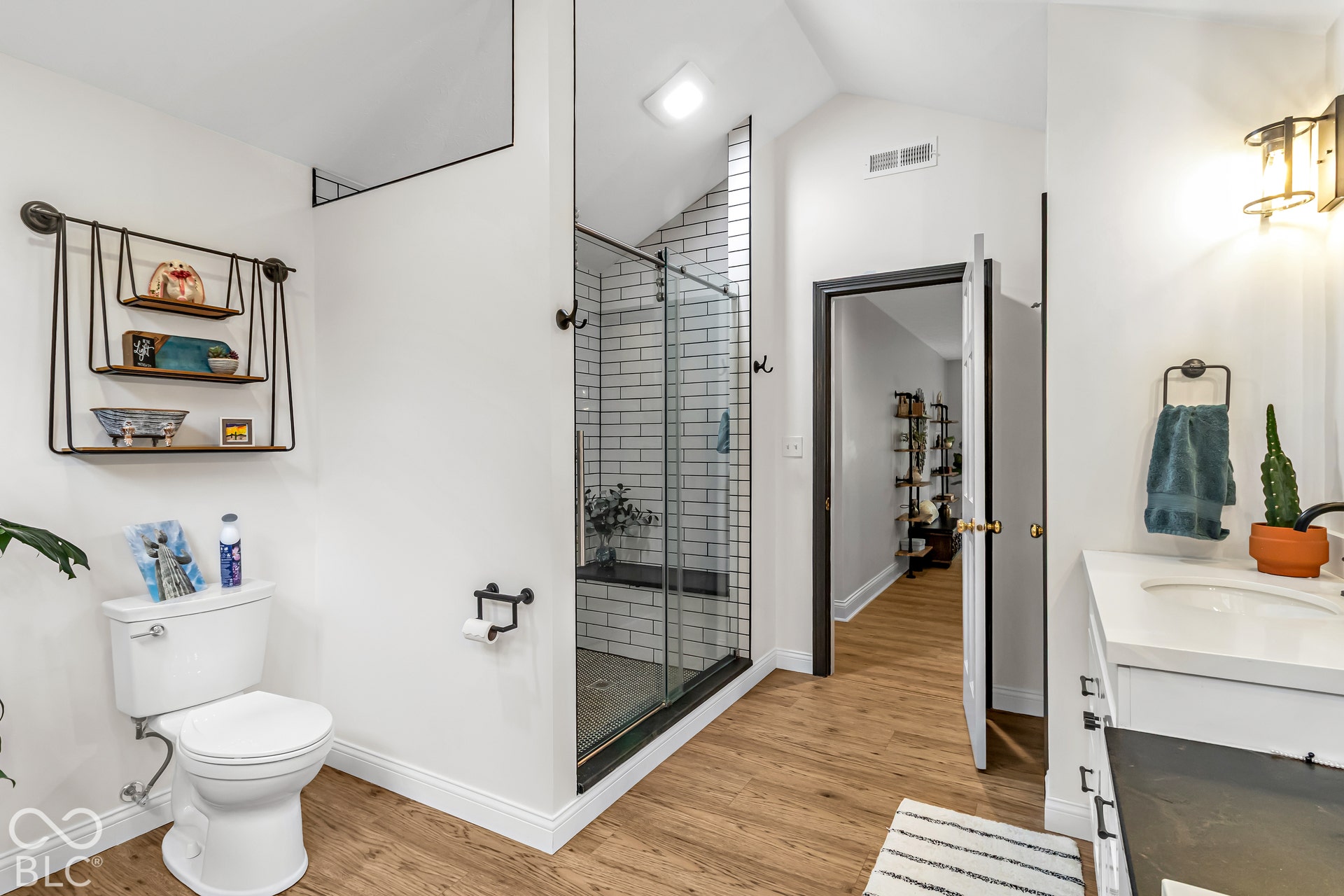 Primary bath with engineered flooring