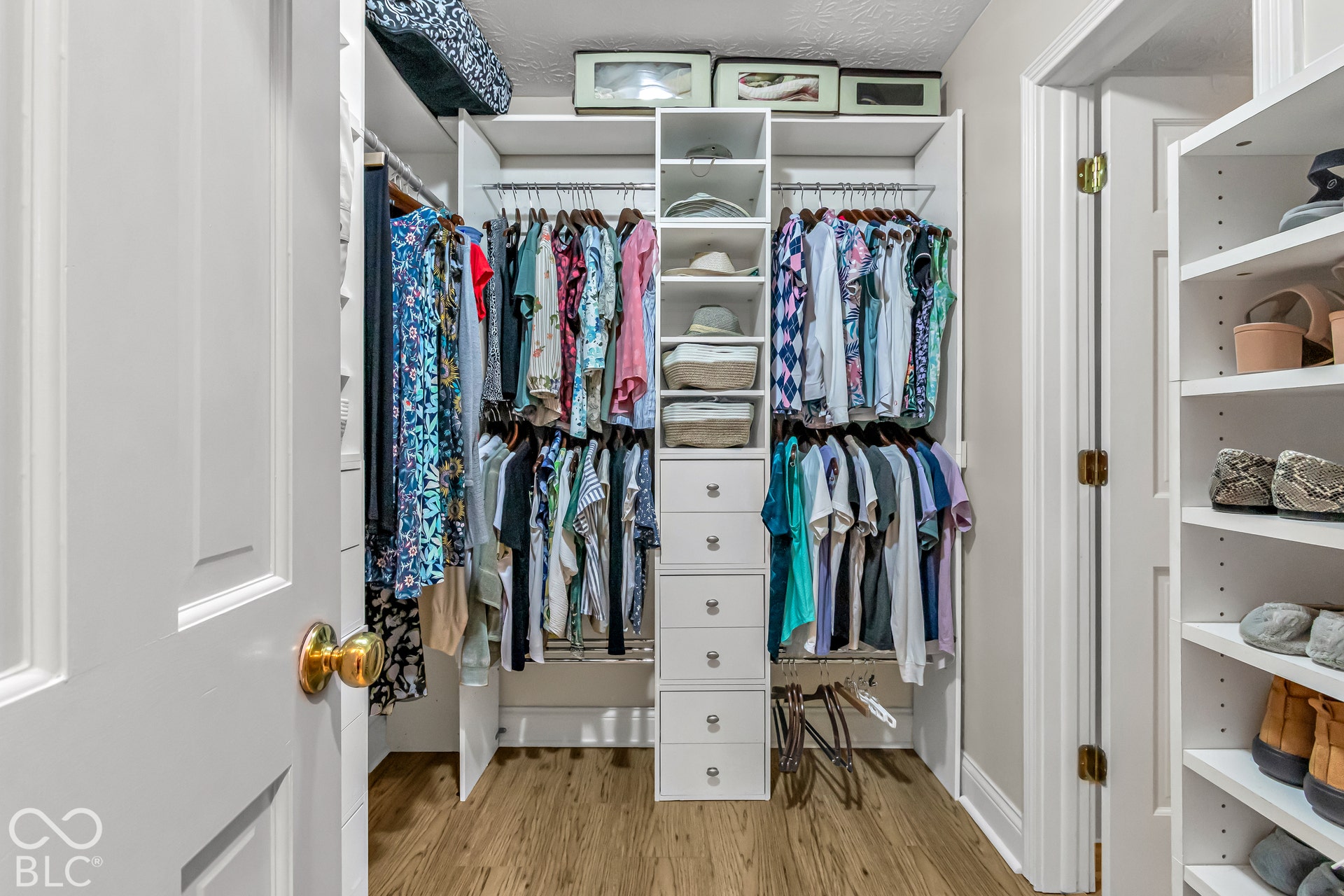 Primary bedroom walk-in closet