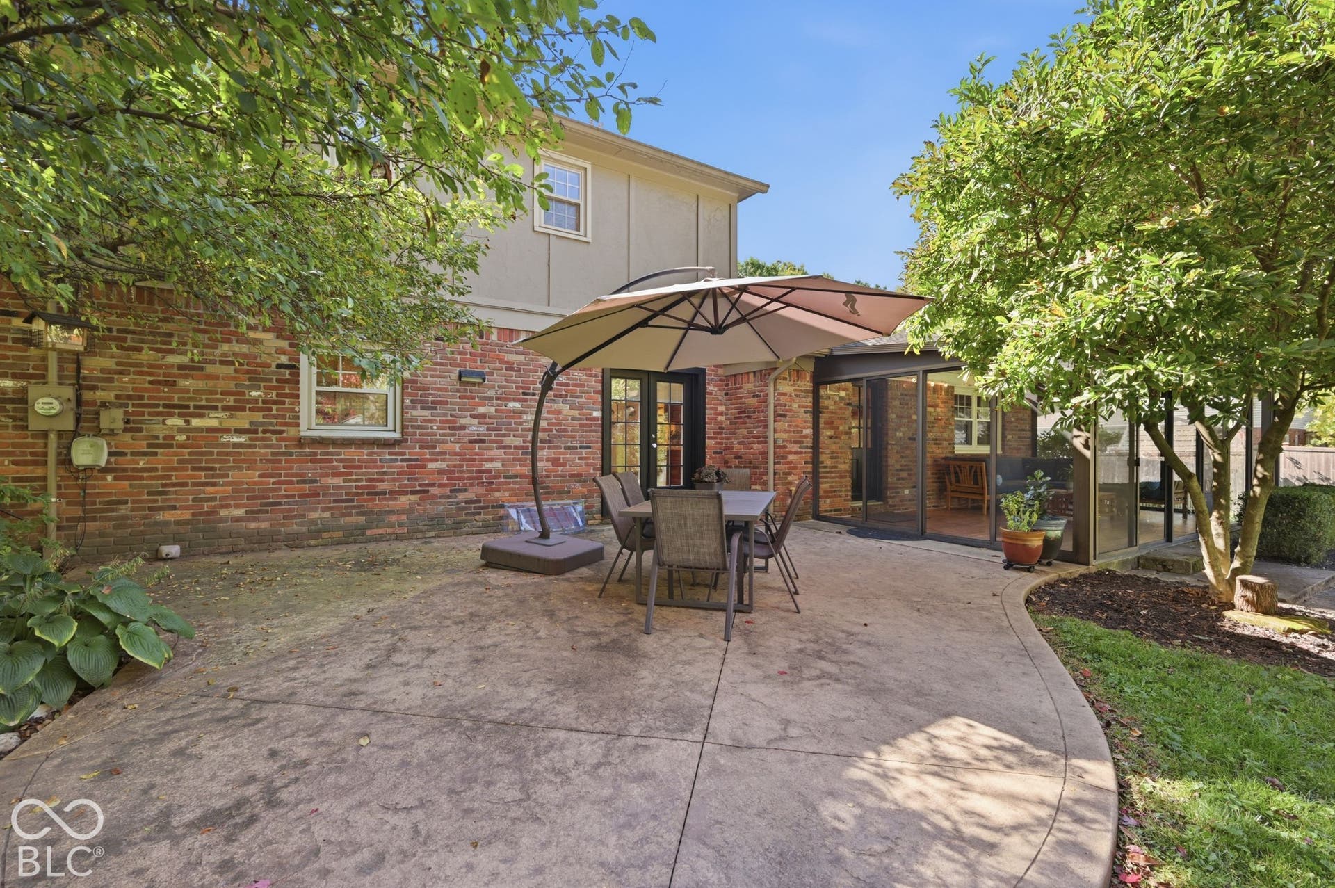 Enjoy the three-season room or head out to the patio