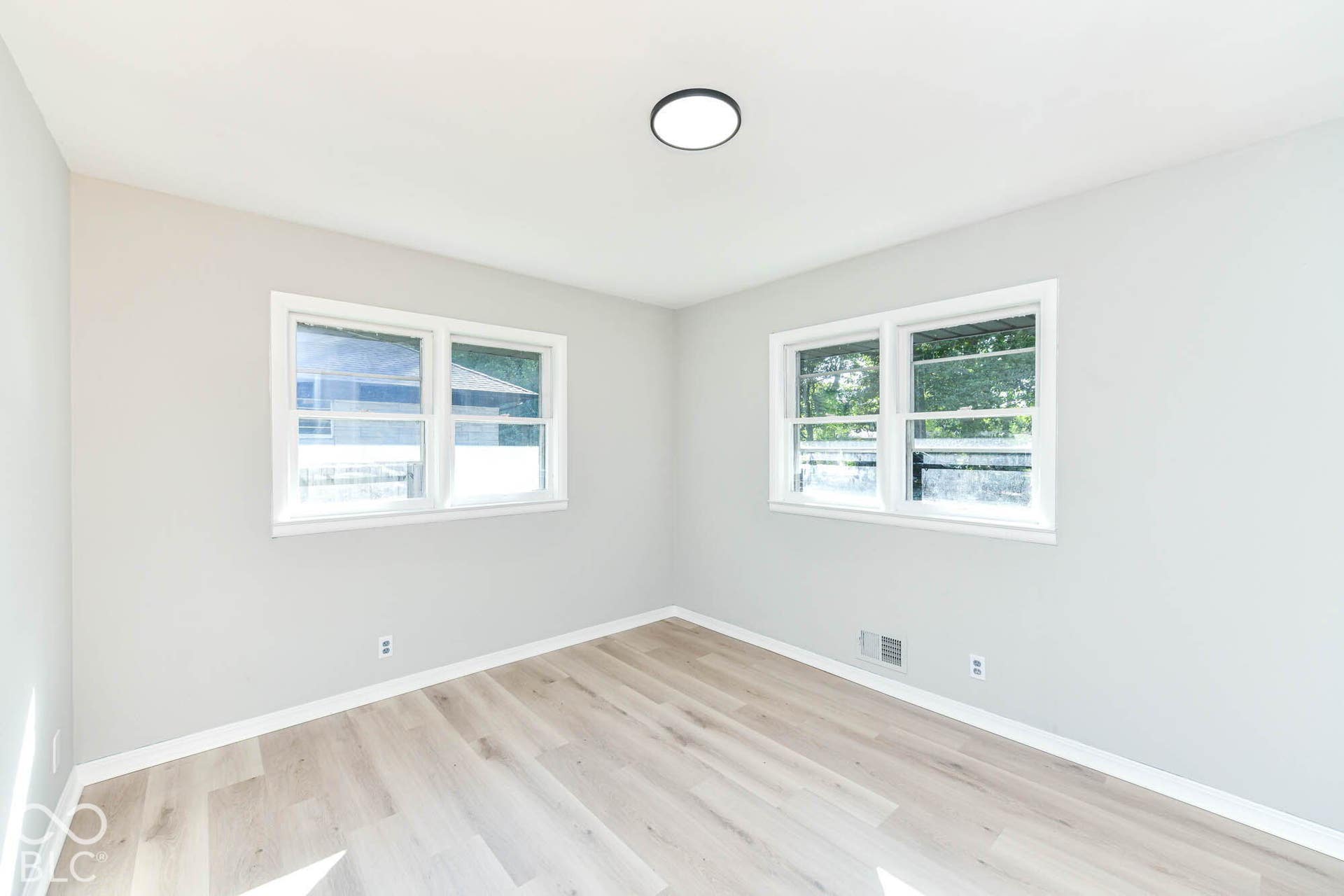 6401 Orinoco Avenue, Indianapolis, IN 46227 Neutral wall palette with wood-finish flooring