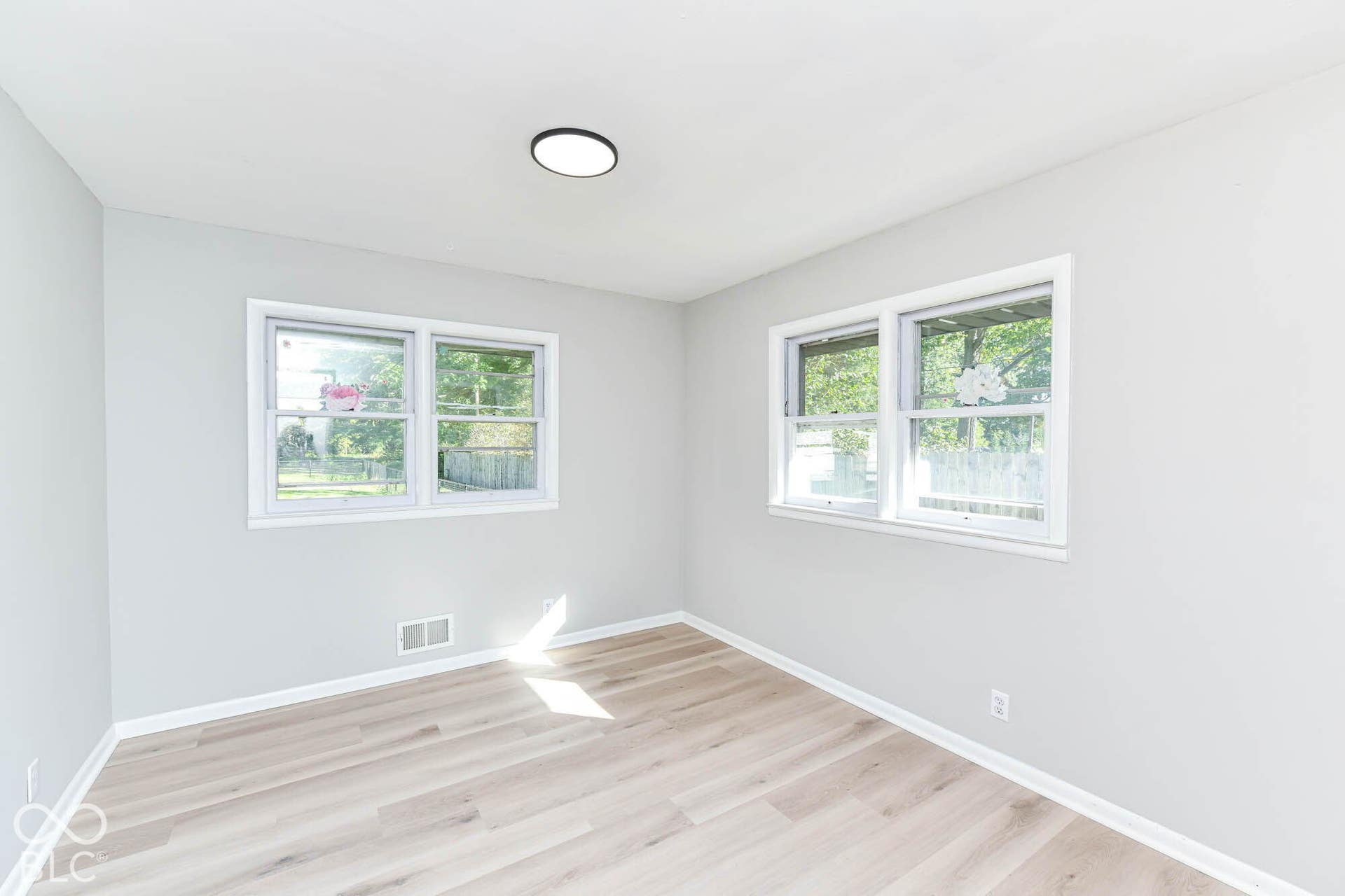 6401 Orinoco Avenue, Indianapolis, IN 46227 Recessed overhead lighting, light wood-finish flooring, and white trim