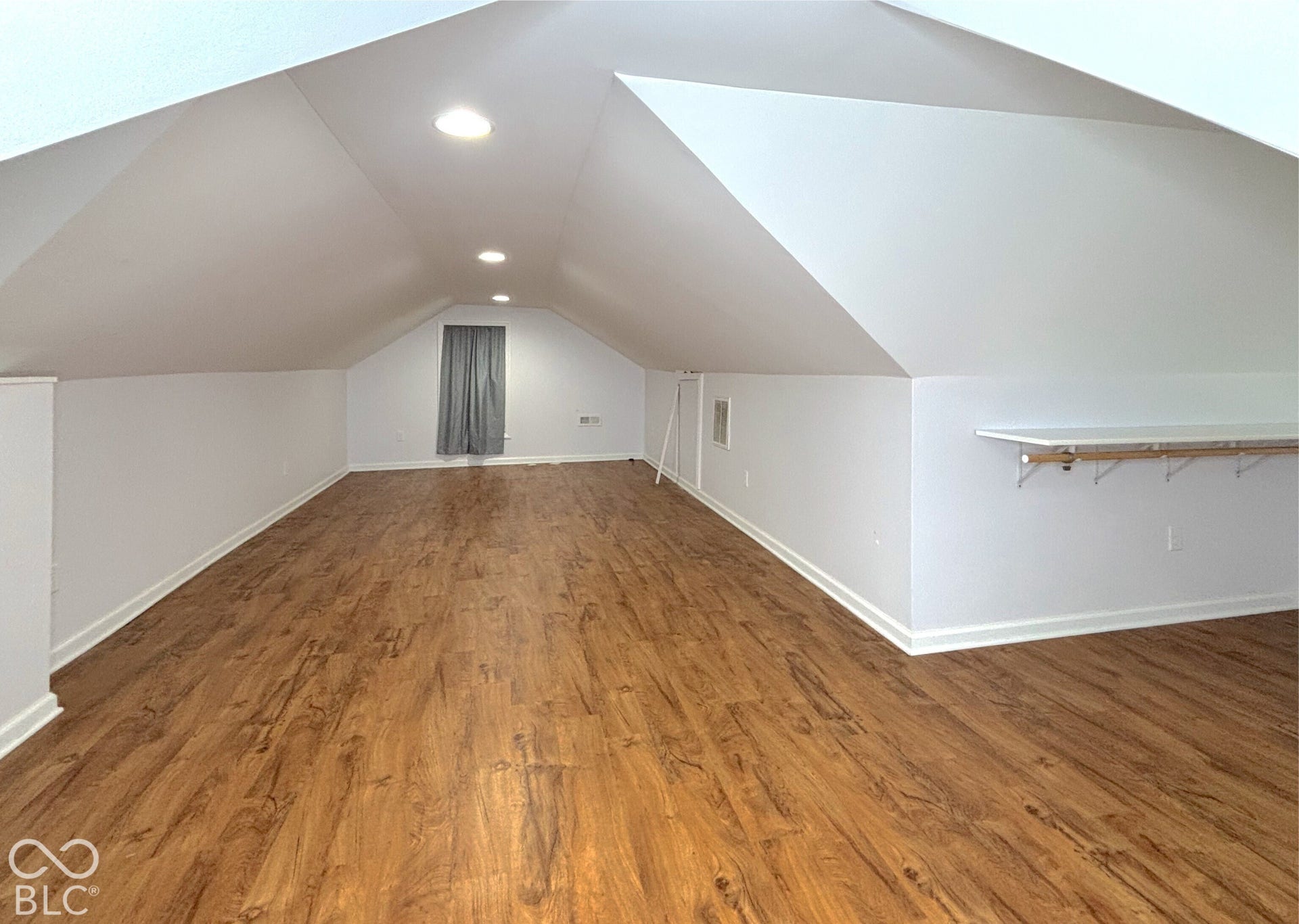 311 B Street S, Thorntown, IN 46071 Expansive attic space featuring wood-finish flooring, recessed lighting, and sloped ceilings