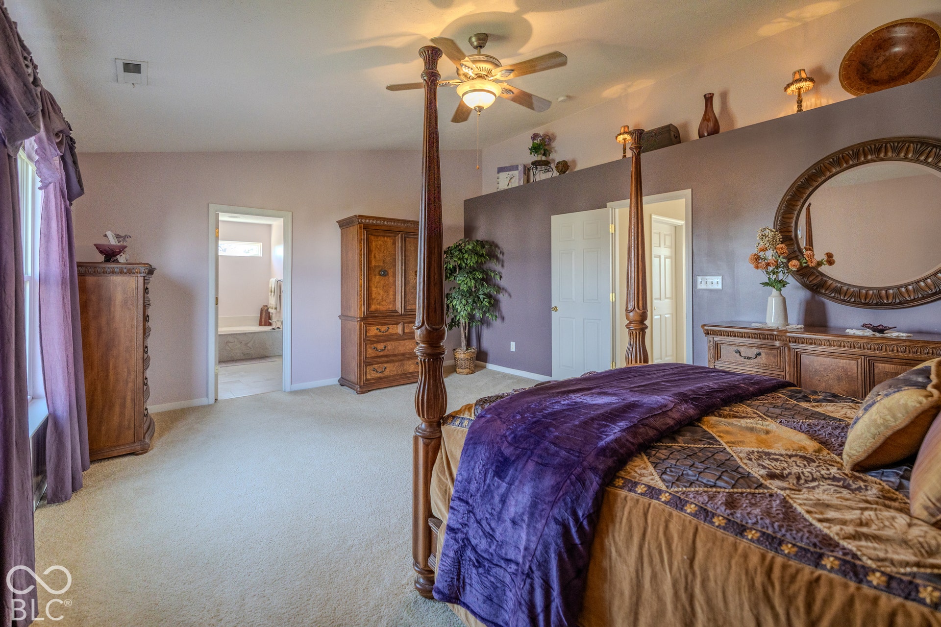 12046 Cowboys, Fishers, IN 46037 The primary bedroom offers large window that let in abundant natural light and offers great pond views. There is plenty of room for a sitting area.