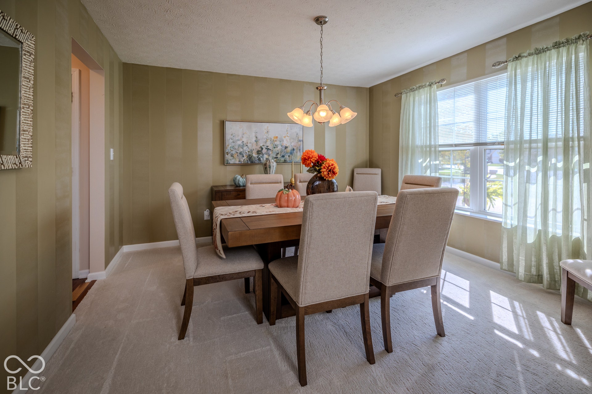 12046 Cowboys, Fishers, IN 46037 The sun-drenched dining room is large enough for even the biggest dinner parties and is adjacent to the formal living room and kitchen.