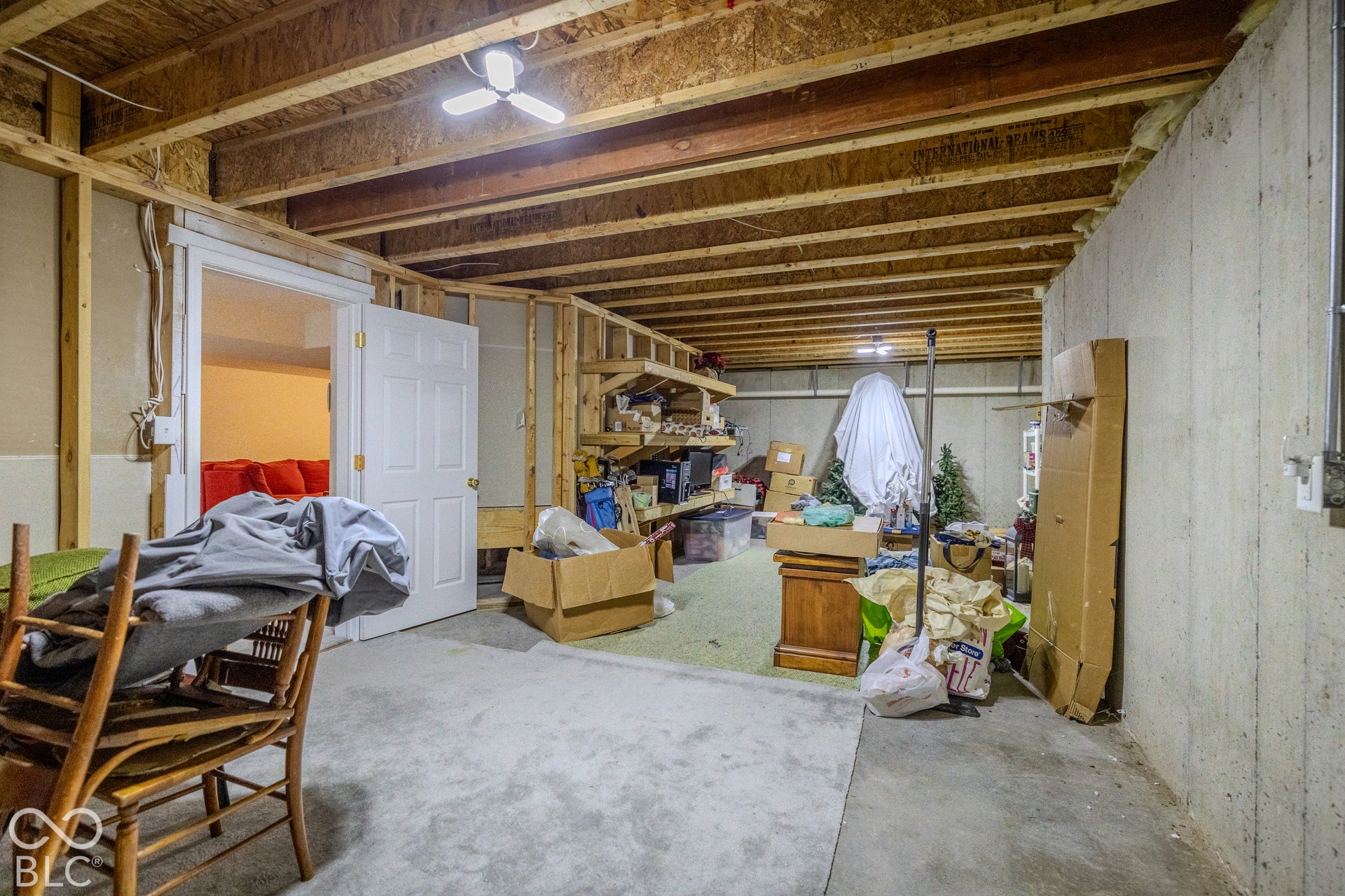12046 Cowboys, Fishers, IN 46037 There is plenty of room for a workshop and storage is this large storage room with built-in shelves.