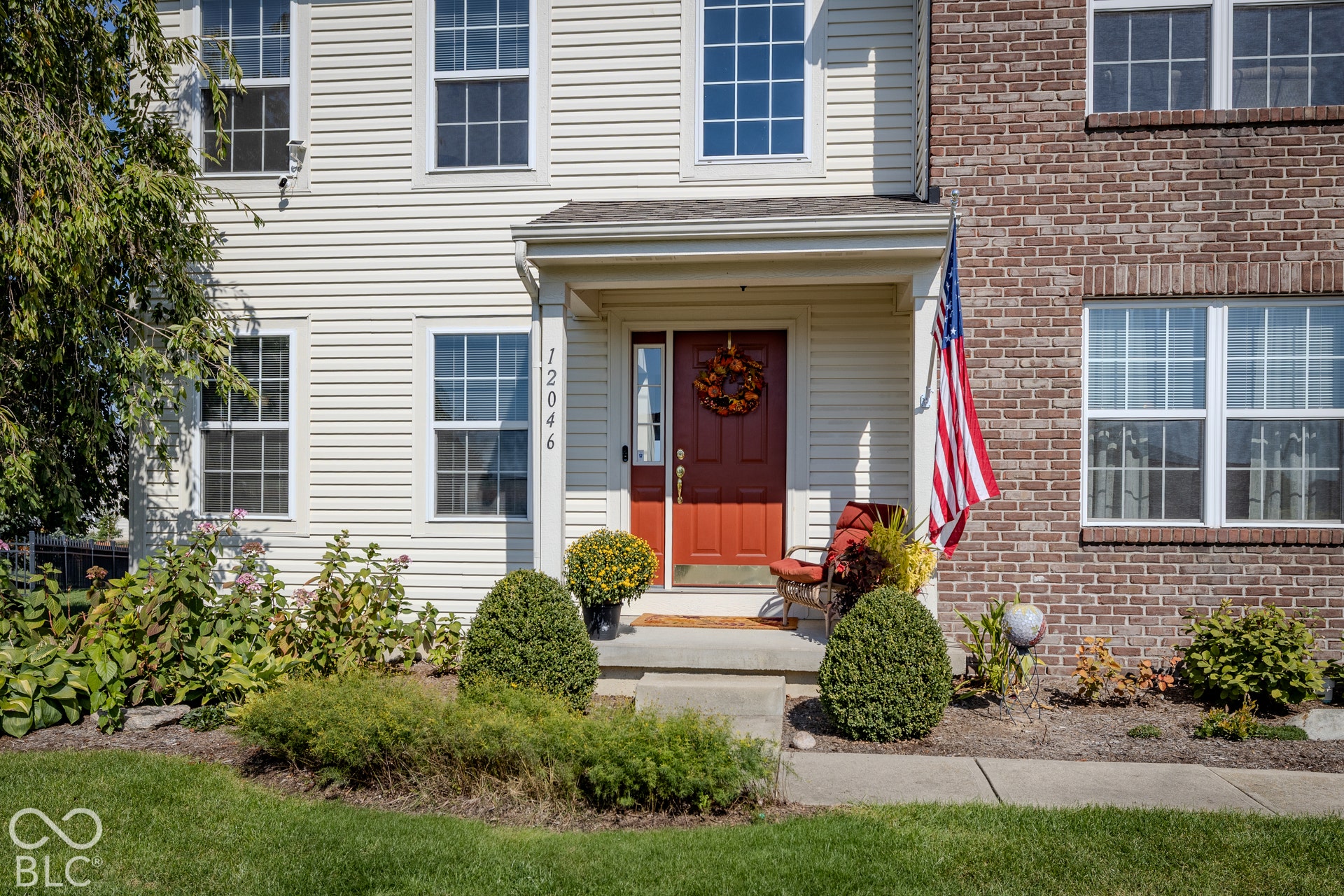 12046 Cowboys, Fishers, IN 46037 Your guests are welcomed by a covered porch and greeted with lush landscaping.