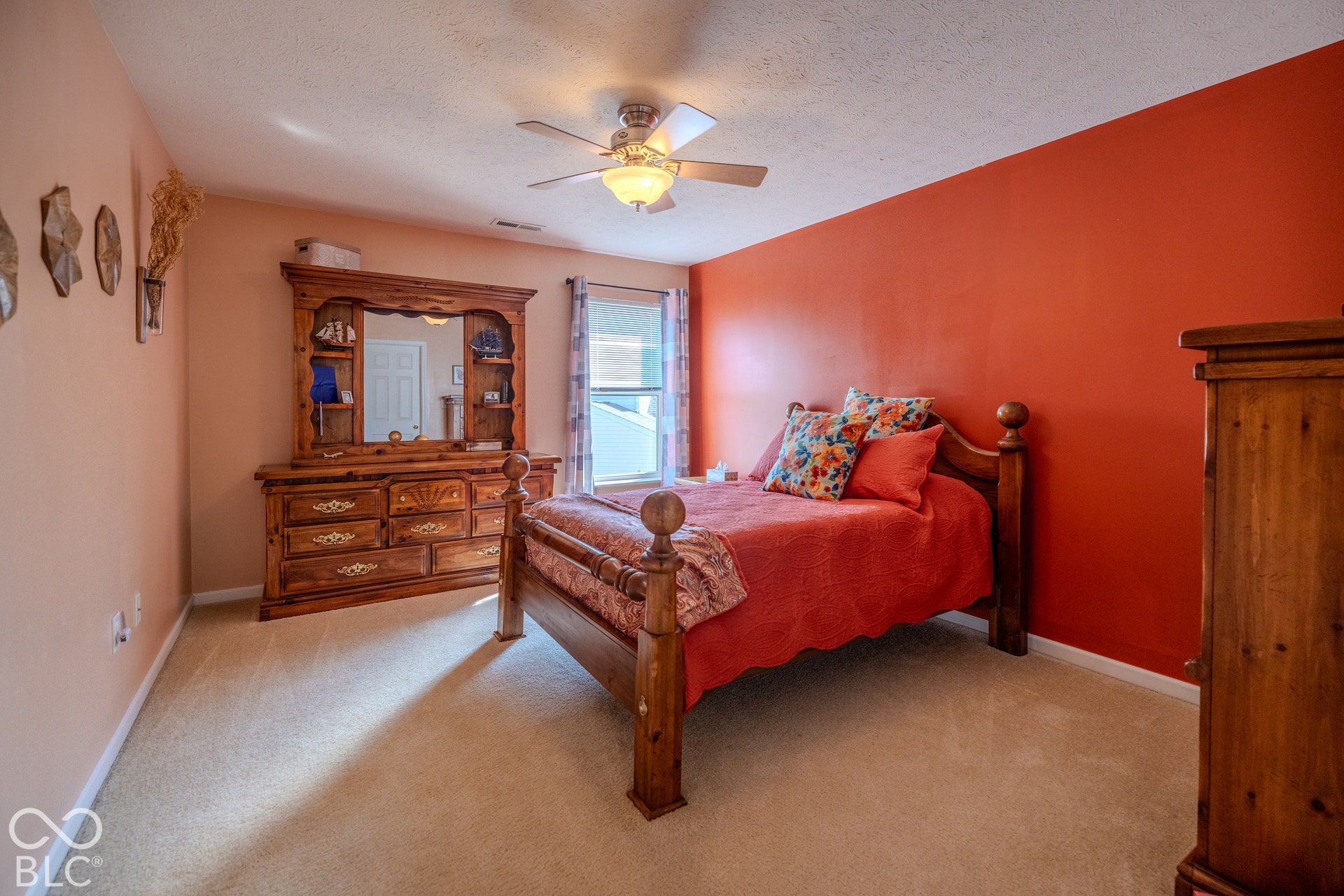 12046 Cowboys, Fishers, IN 46037 Bedroom 2 has a large window and a ceiling fan to provide ventilation. Also features a large walk-in closet.