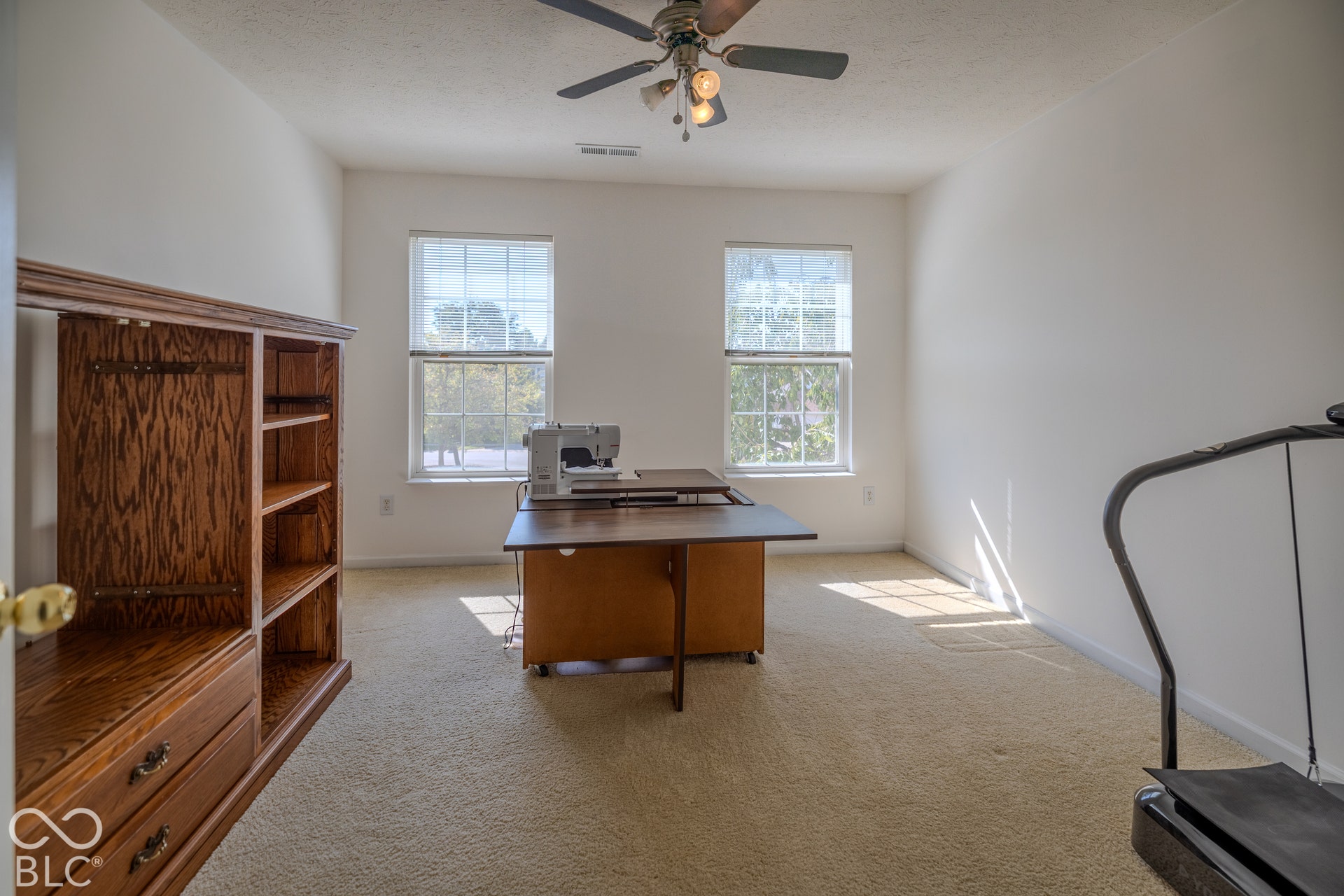 12046 Cowboys, Fishers, IN 46037 Bedroom 3 is light and bright and currently is used as a craft room.