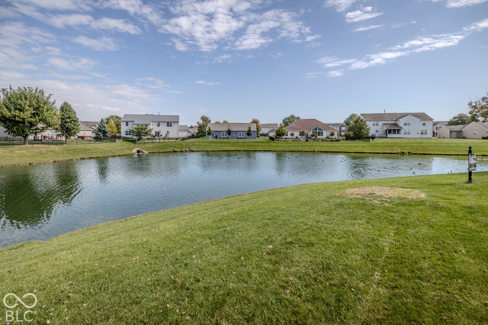 12046 Cowboys, Fishers, IN 46037 The large yard and relaxing pond views are a highlight of this home.