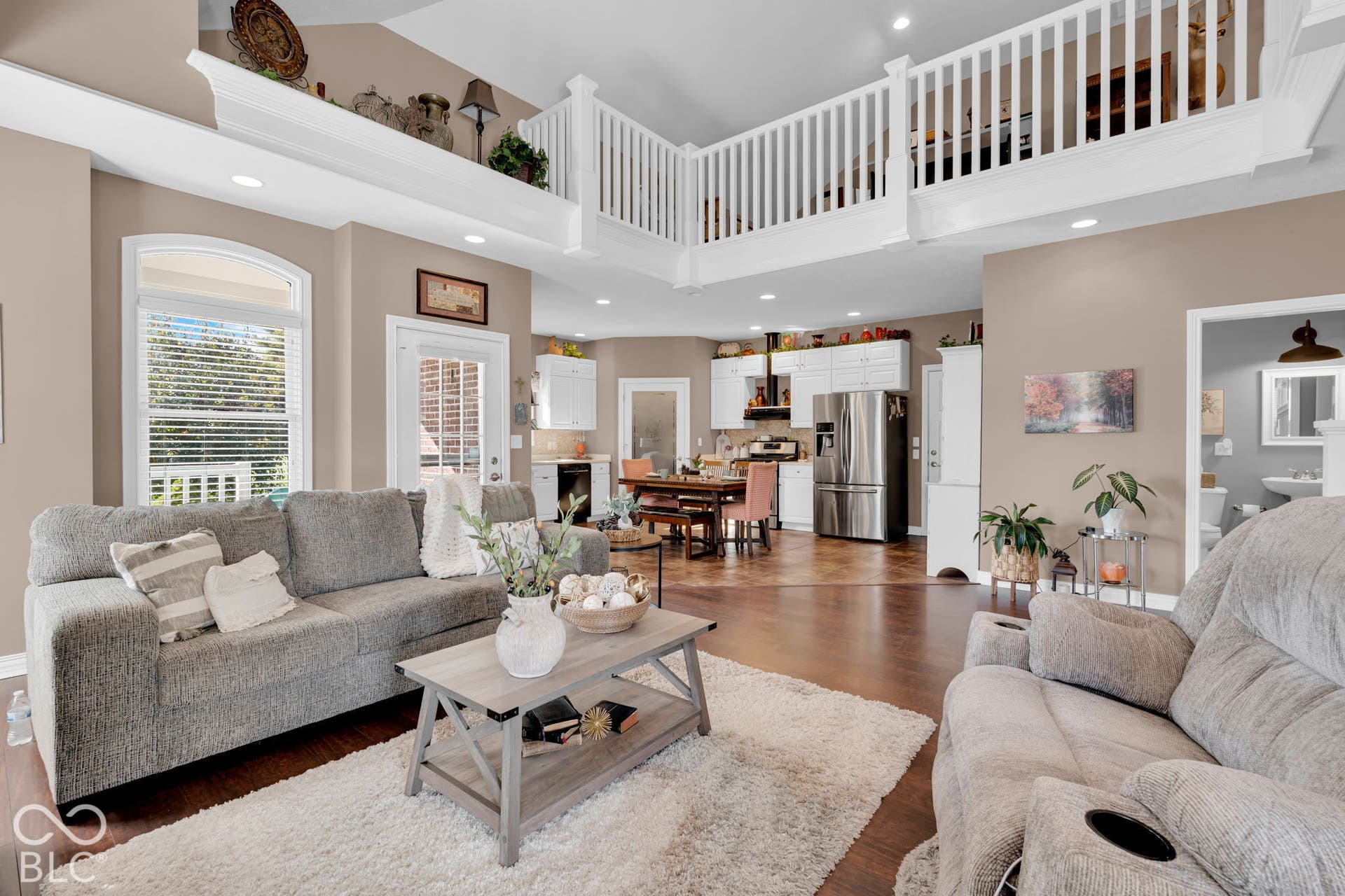 Open flow from living room into the kitchen.