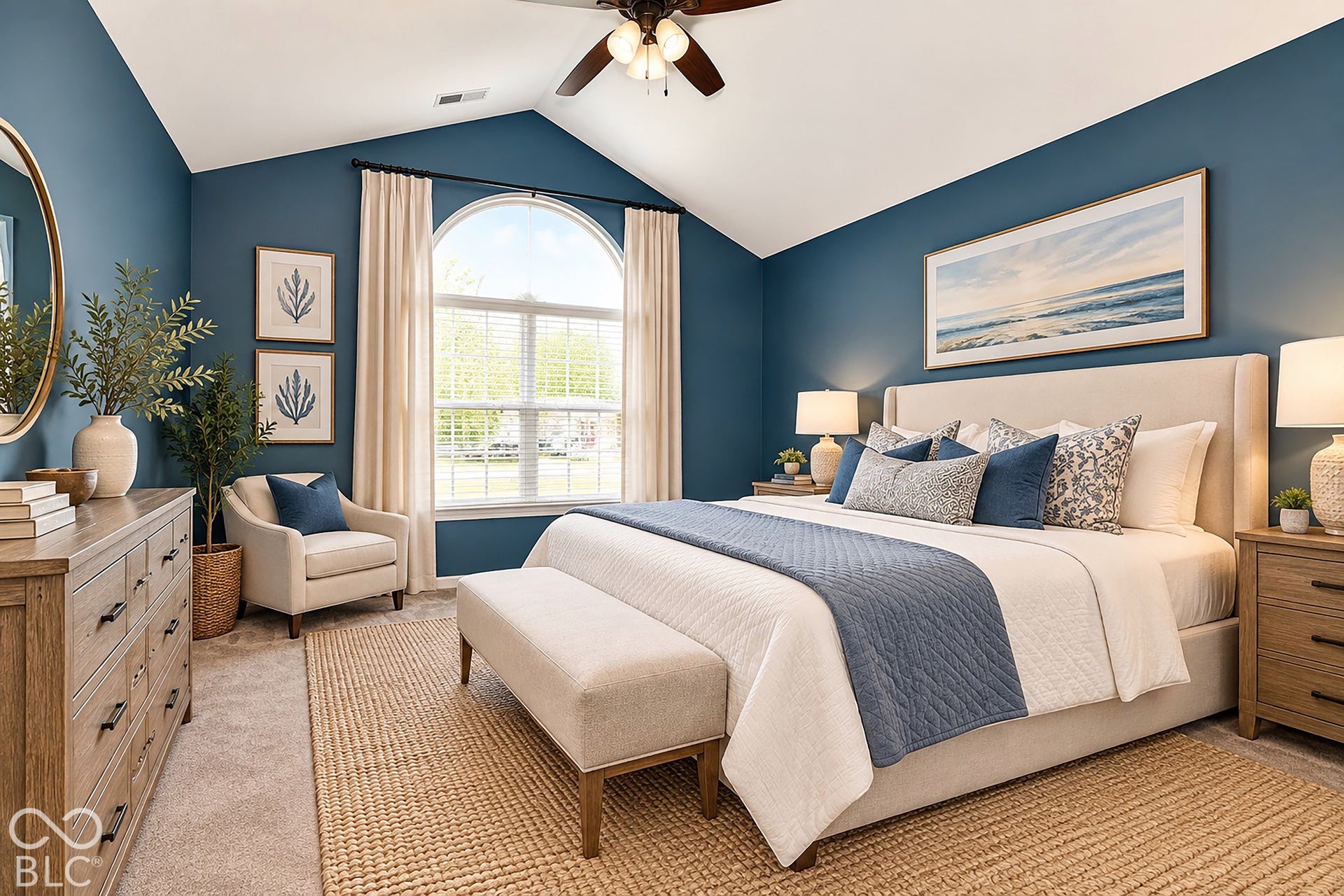 6673 Avila Way, Fishers, IN 46038 Virtually Altered - Vaulted ceiling with a ceiling fan, arched window with blinds, and carpeted flooring