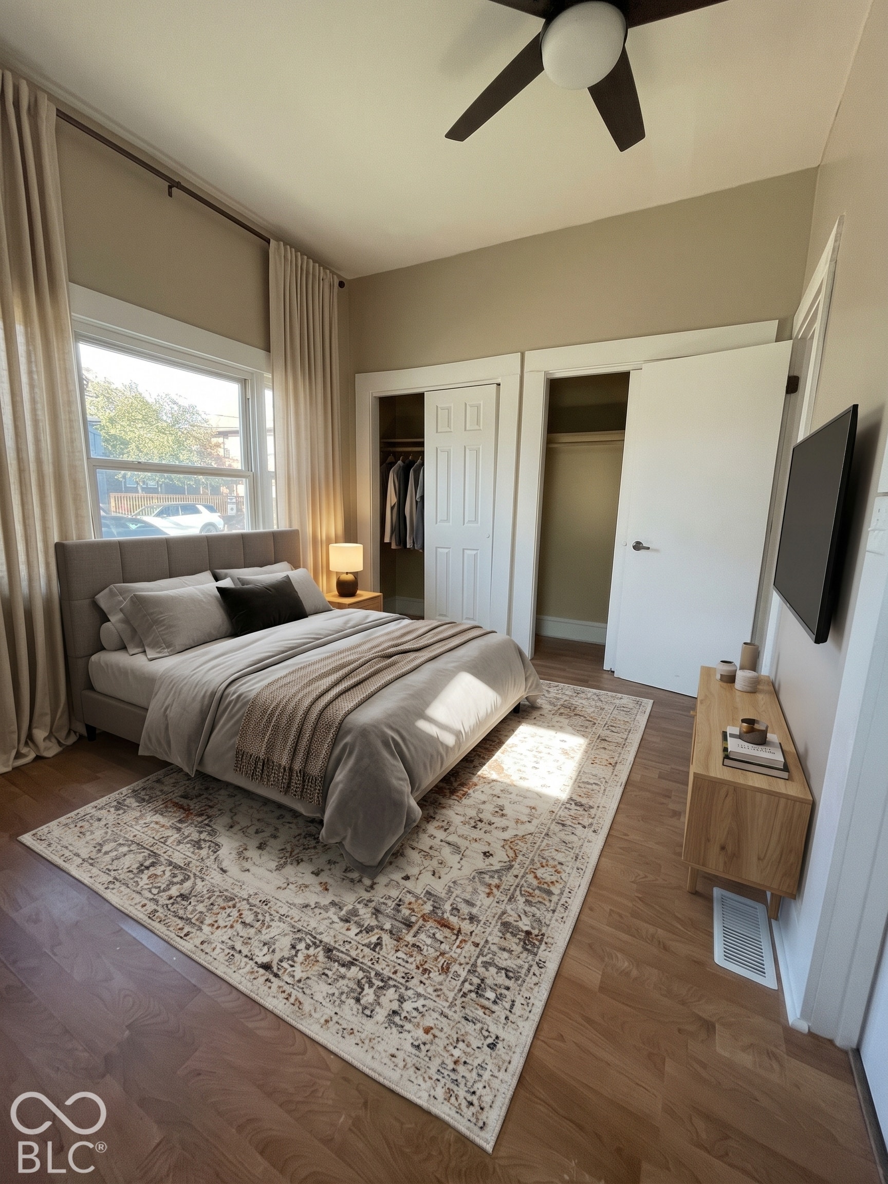 One of 3 bedrooms featuring an en-suite and two closet spaces.