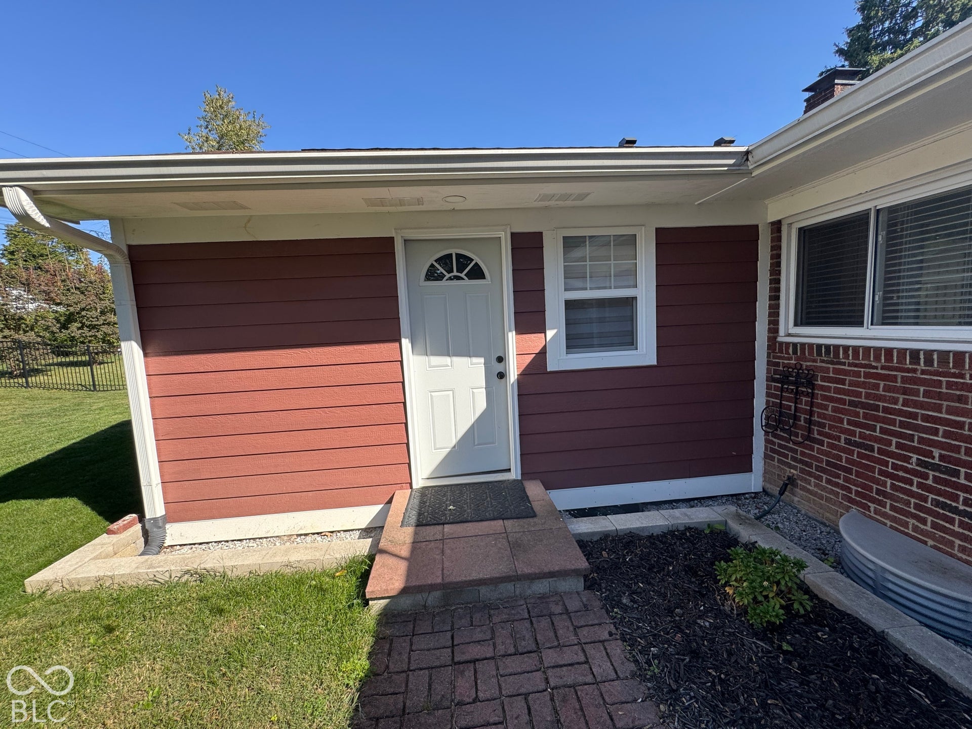 Addition added to back of home to include the primary bathroom and primary walk in closet and back door to enjoy this beautiful backyard.
