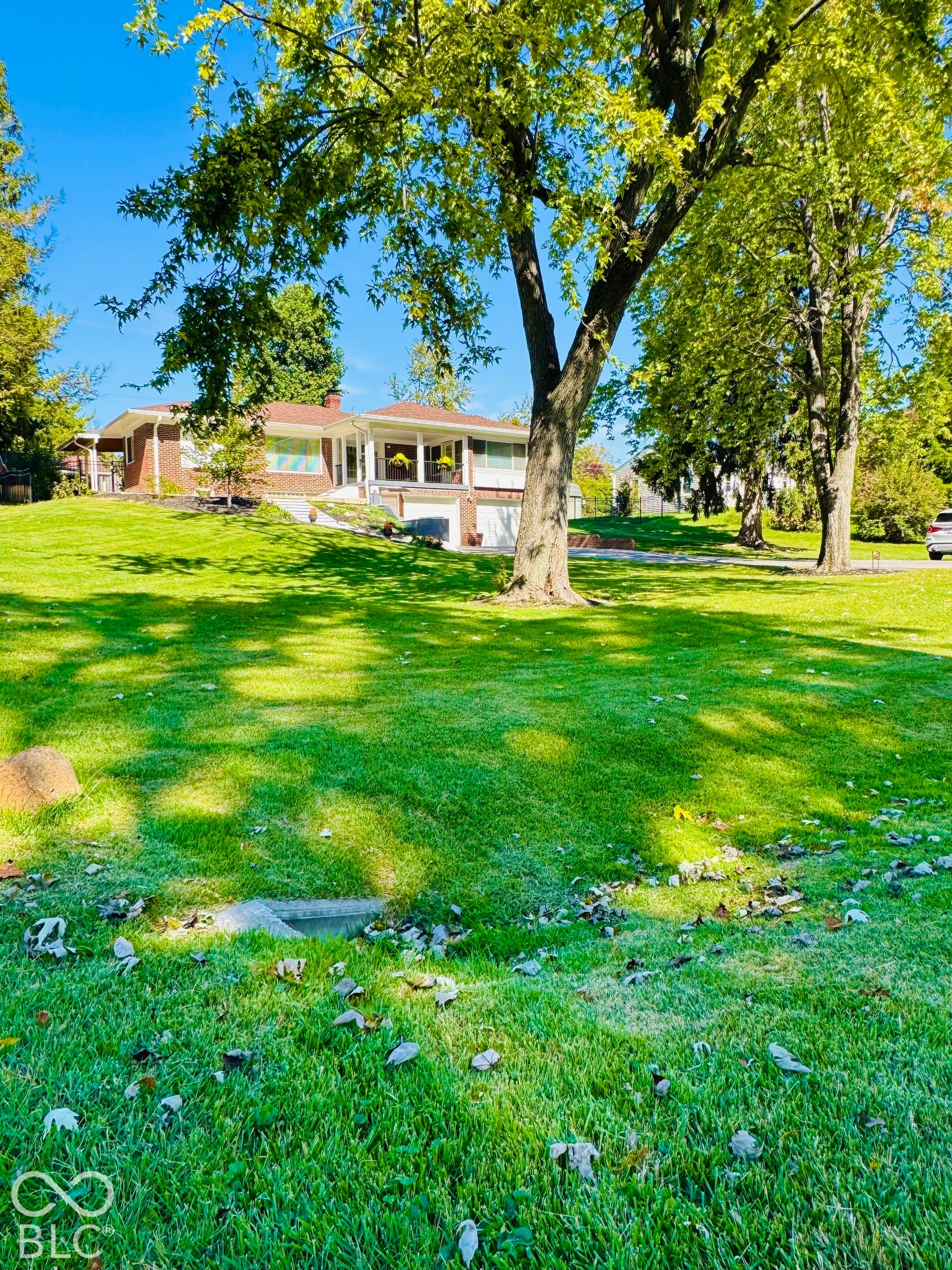 THIS BEAUTIFUL RANCH HOME WITH HUGE FRONT AND BACK YARDS