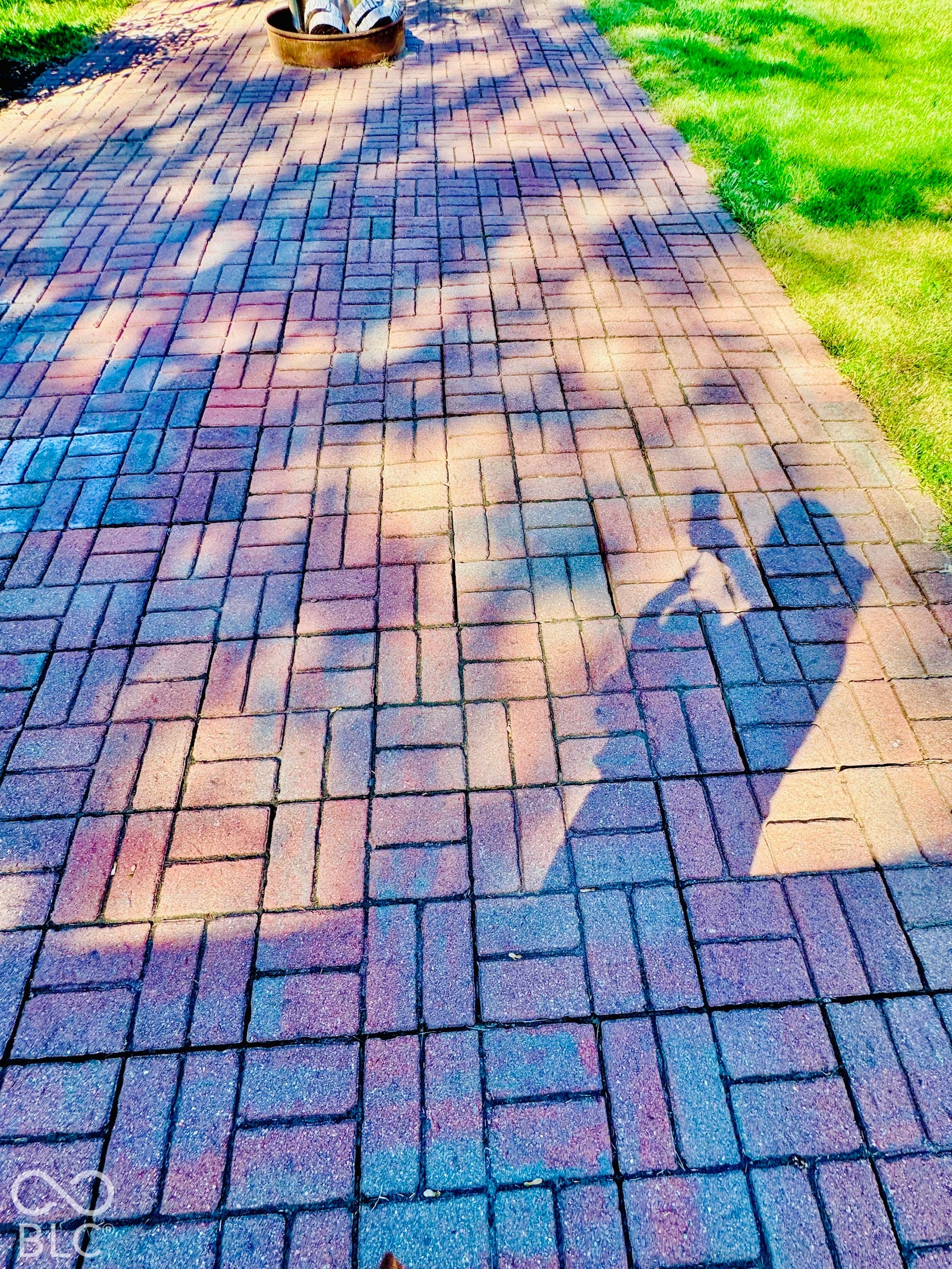 Paver walkway featuring a basketweave pattern