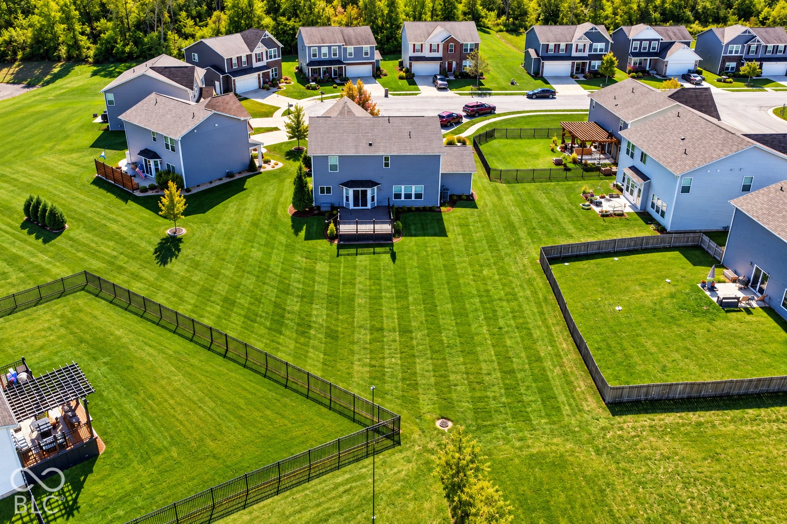 *AI - Color Enhancement* Expansive green lawn with defined mowing patterns