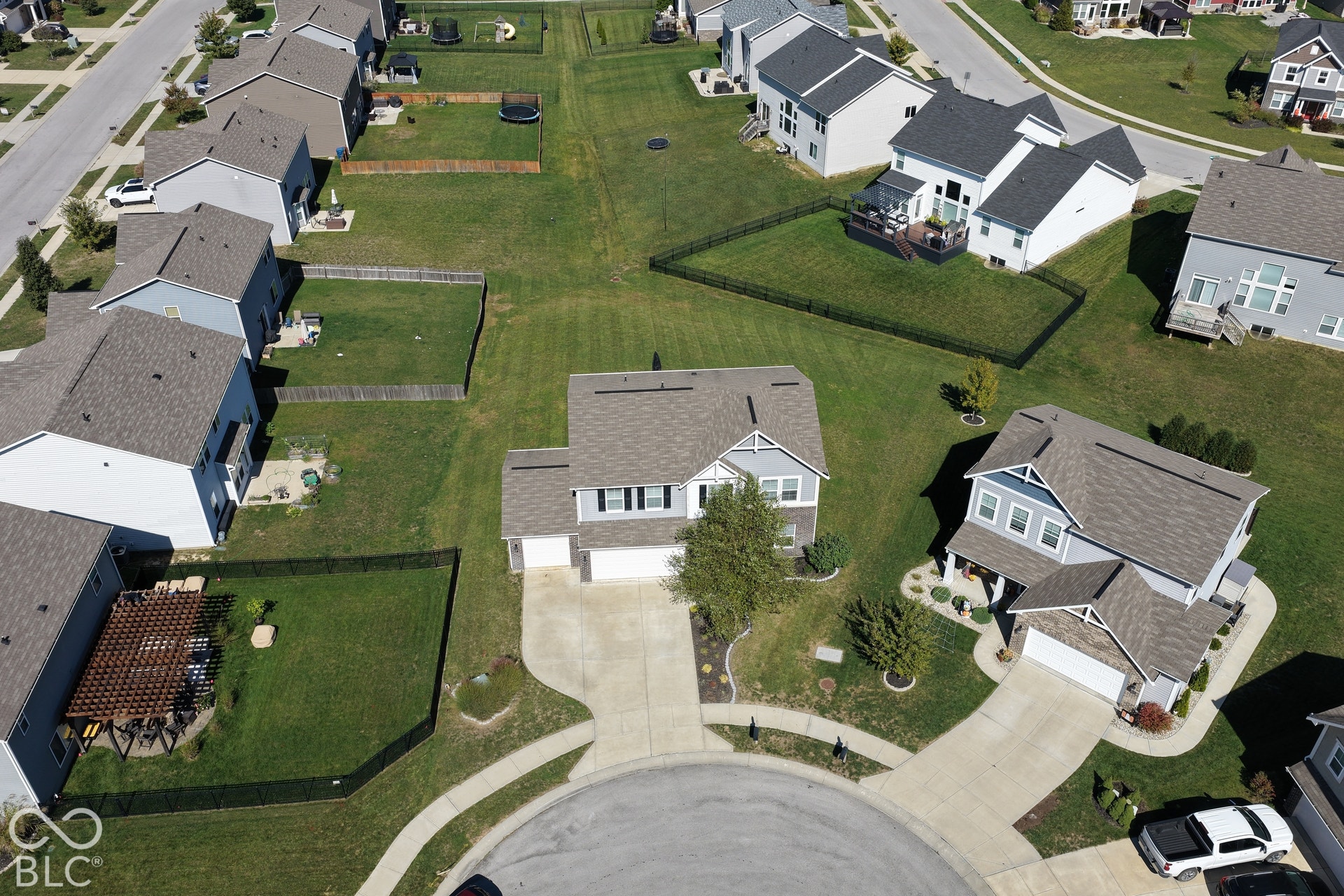 *Unaltered Exterior Stills* Two-story residence with a two-car garage, concrete driveway, and a cul-de-sac location