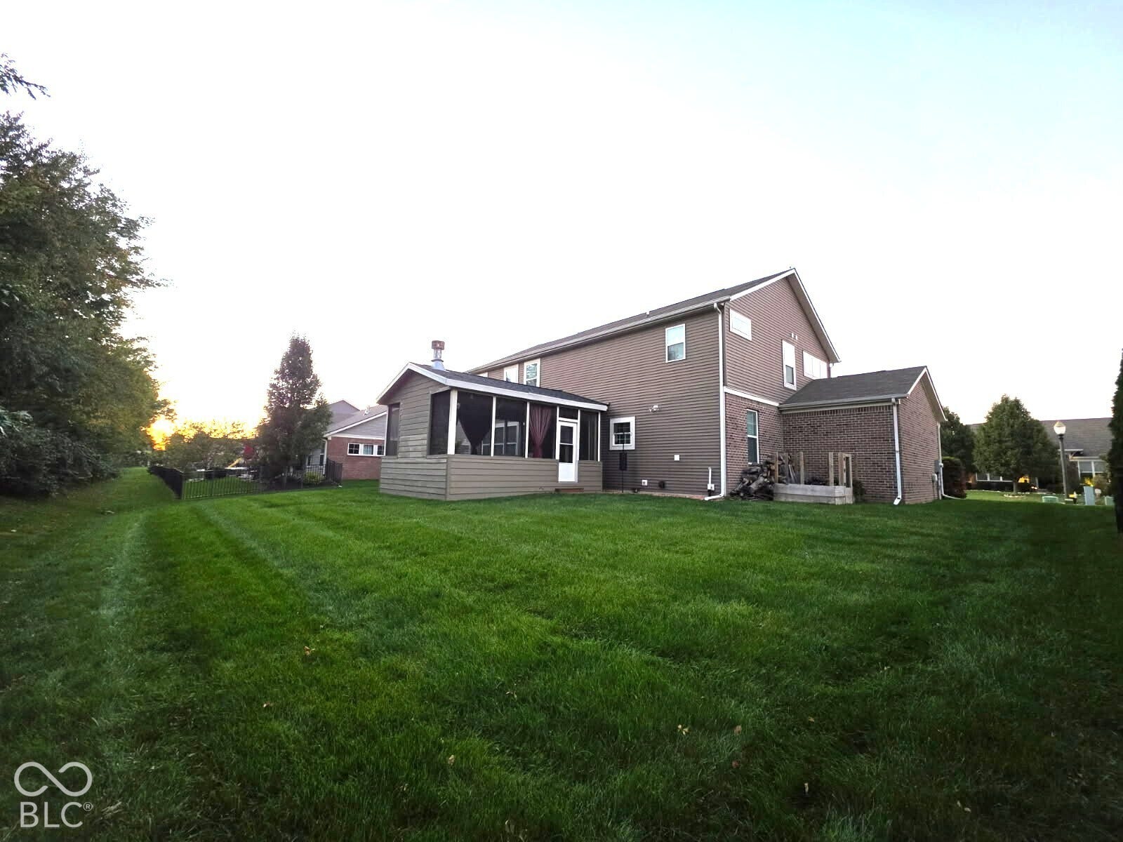 5579 W Turnbuckle Place, McCordsville, IN 46055 Nice sized yard, raised garden beds and plenty of firewood for the beatiful screened porch and stone fireplace.