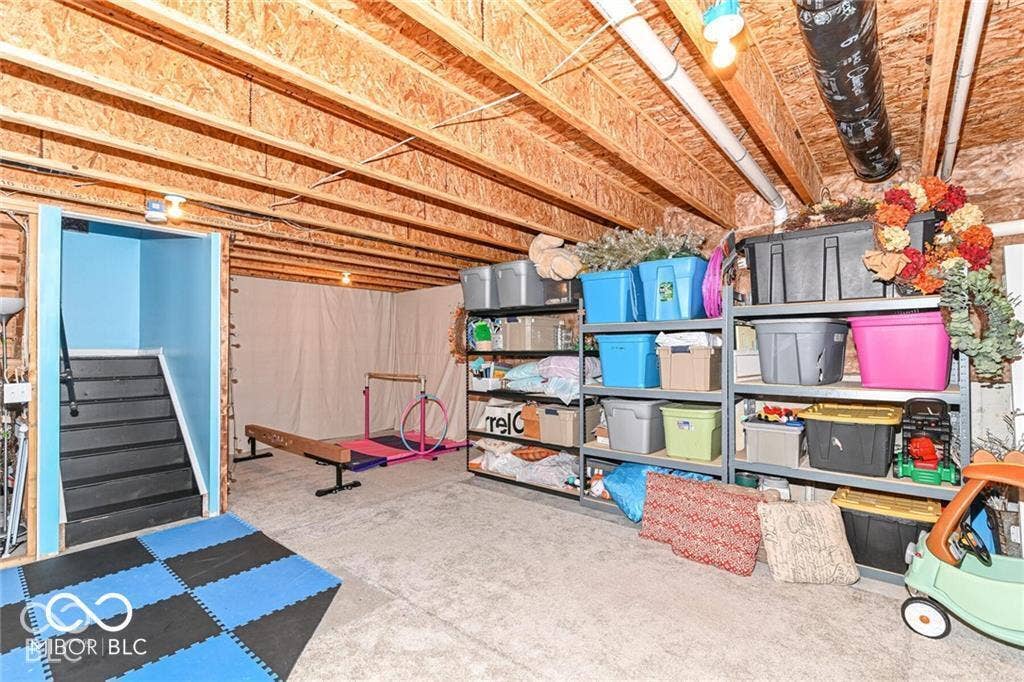 5579 W Turnbuckle Place, McCordsville, IN 46055 This unfinished basement offers 9' ceiling, plumbed for a full bath, egress window, sump pump, battery backup, water softener and wonderful possibilities.