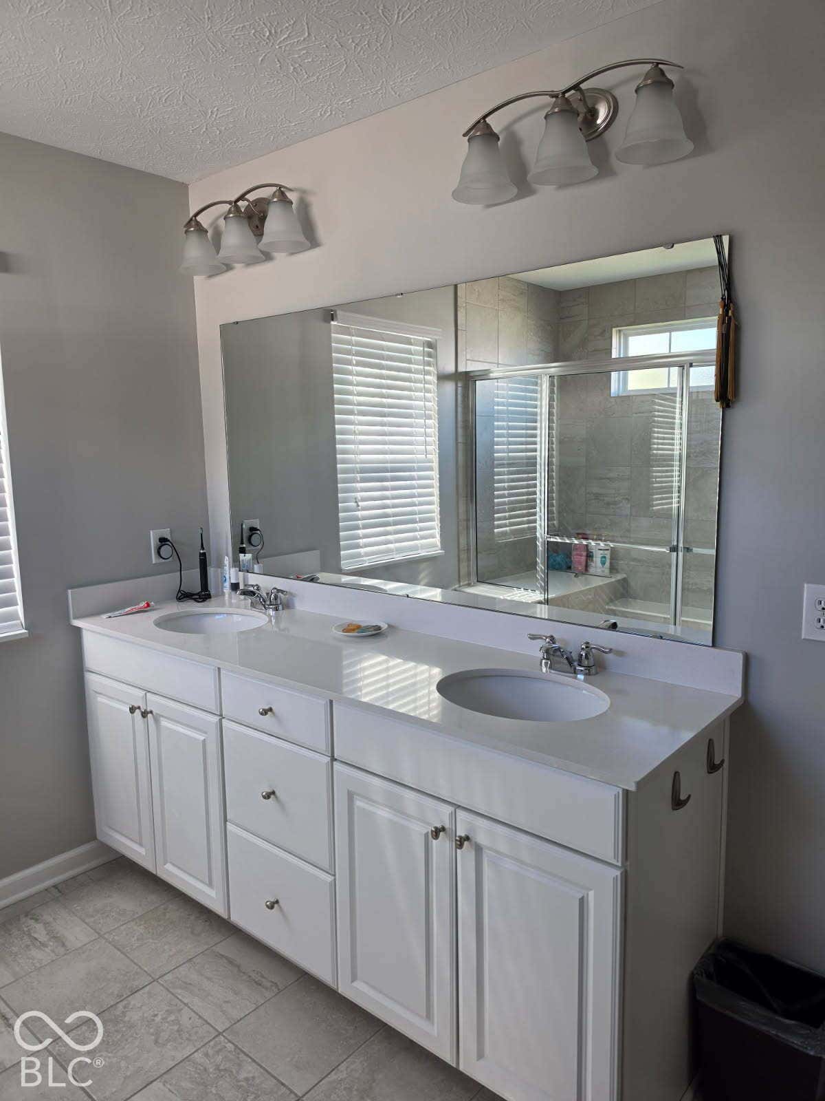 5579 W Turnbuckle Place, McCordsville, IN 46055 Separate commode room, huge tiled walk-in shower, dual sinks, quartz countertop, ceramic tile flooring, large walk-in closet, linen closet.