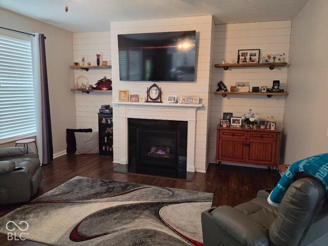 5579 W Turnbuckle Place, McCordsville, IN 46055 9' ceiling, wood flooring, gas fireplace, shelving, ceiling fan, bead board, terrific natural light.