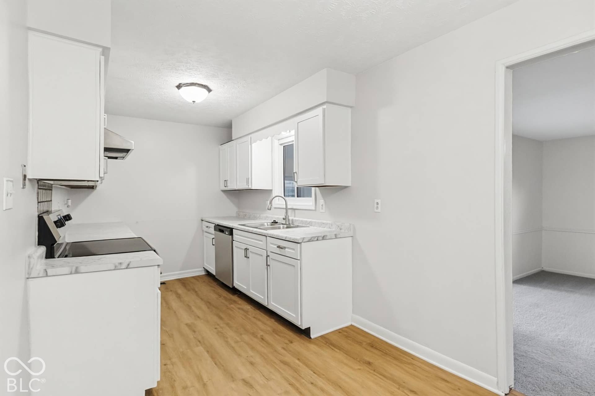 White cabinetry with stainless steel hardware