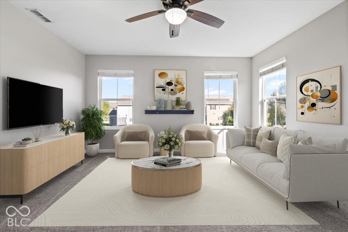 5570 W Stream Drive, McCordsville, IN 46055 Virtually Altered - Recessed lighting, ceiling fan with integrated light, multiple windows, light neutral wall color, and carpeted flooring
