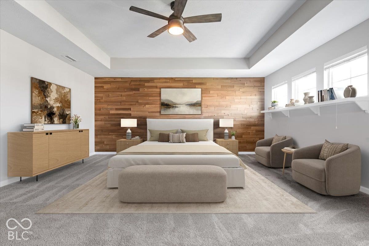 5570 W Stream Drive, McCordsville, IN 46055 Virtually Altered - Tray ceiling with a ceiling fan light fixture, wood-paneled accent wall, and multiple windows with built-in shelving