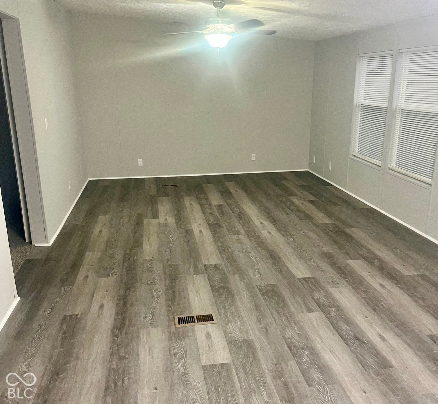 Wood-finish plank flooring throughout