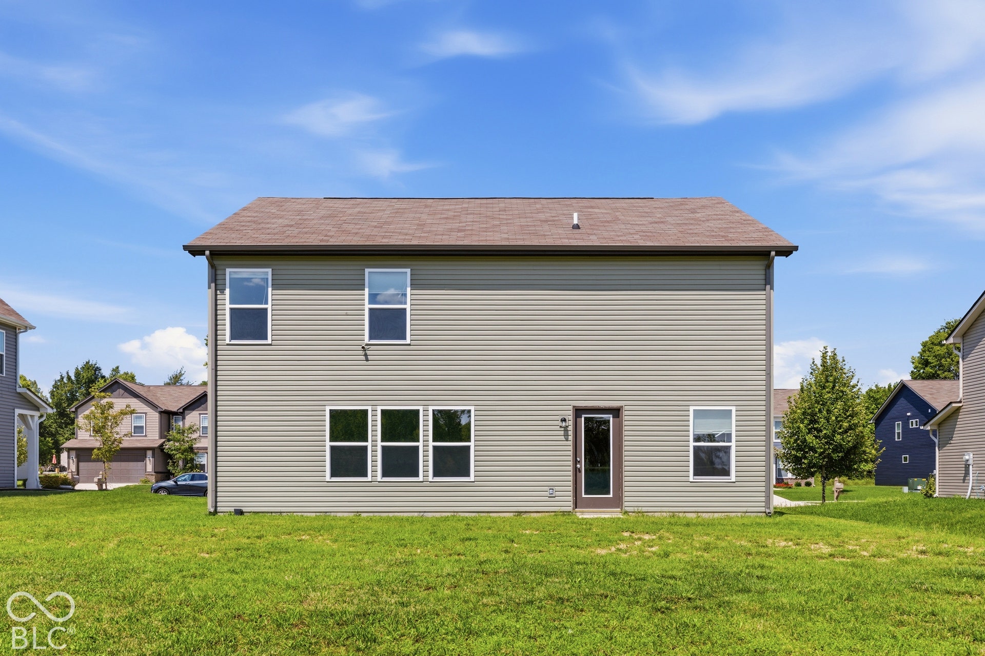 10525 Broadford Street, Indianapolis, IN 46239 Two-story exterior with light-colored siding, multiple windows, and a prominent brown roof