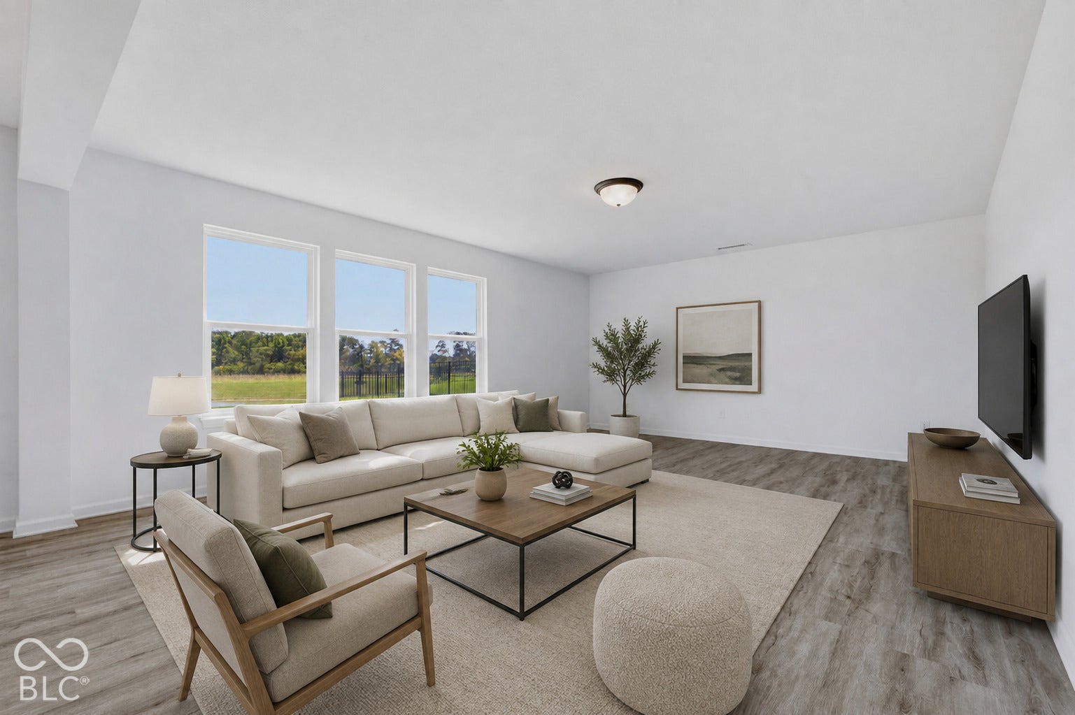 10525 Broadford Street, Indianapolis, IN 46239 Recessed ceiling lights, wood-finish flooring, and multiple windows providing natural illumination