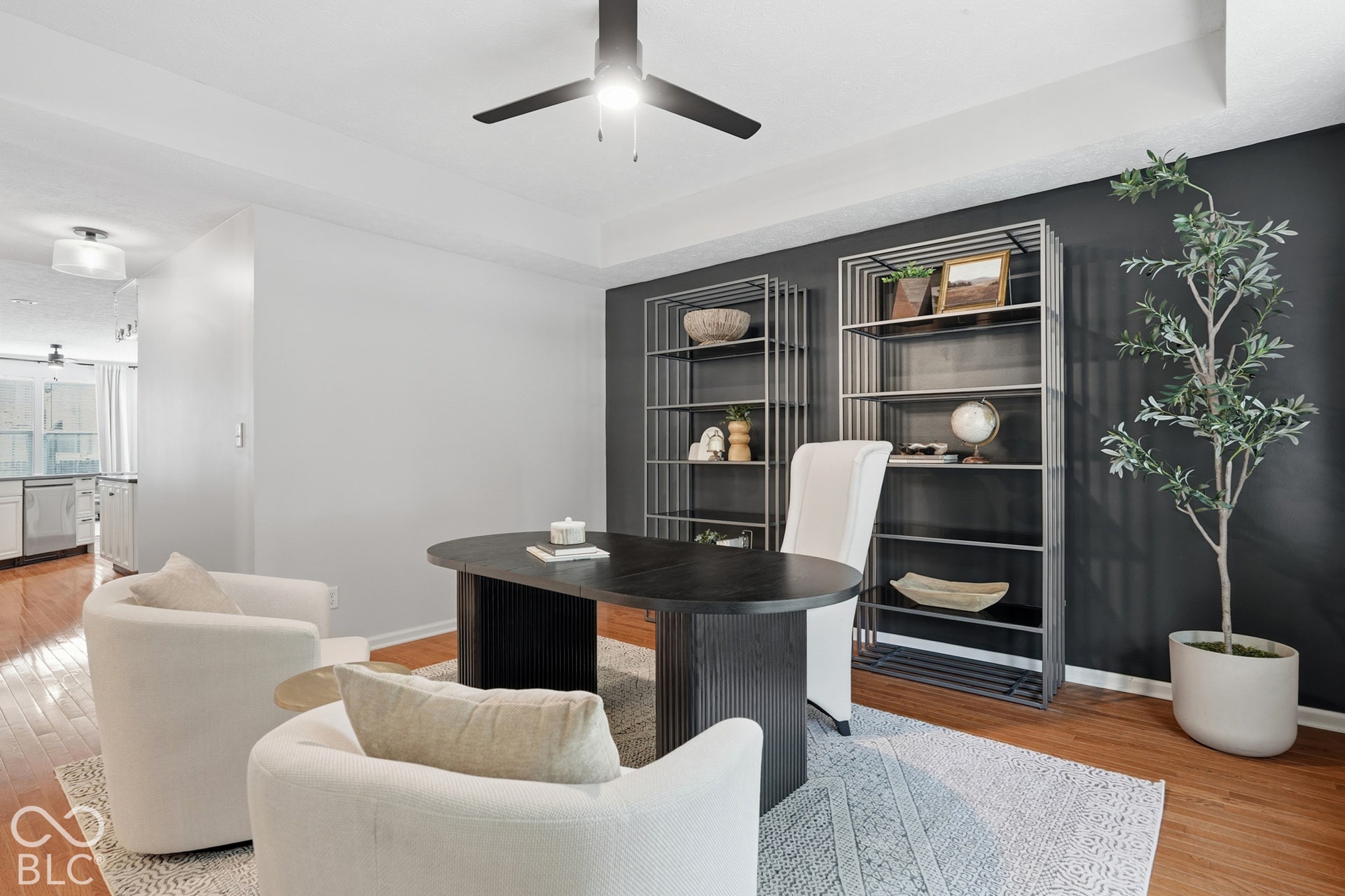 Recessed ceiling with a modern ceiling fan and light fixture