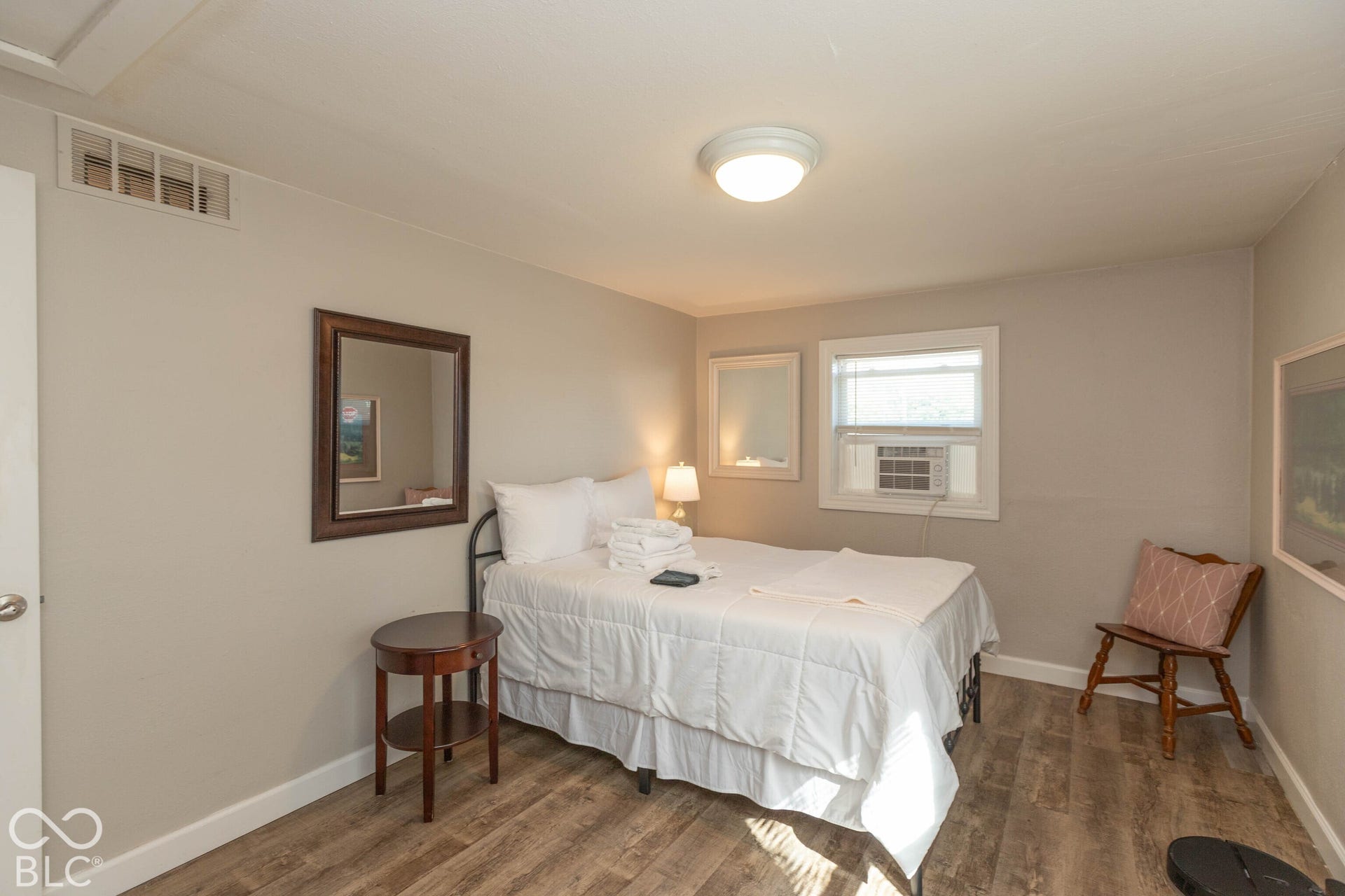 Wood-finish flooring with neutral wall tones