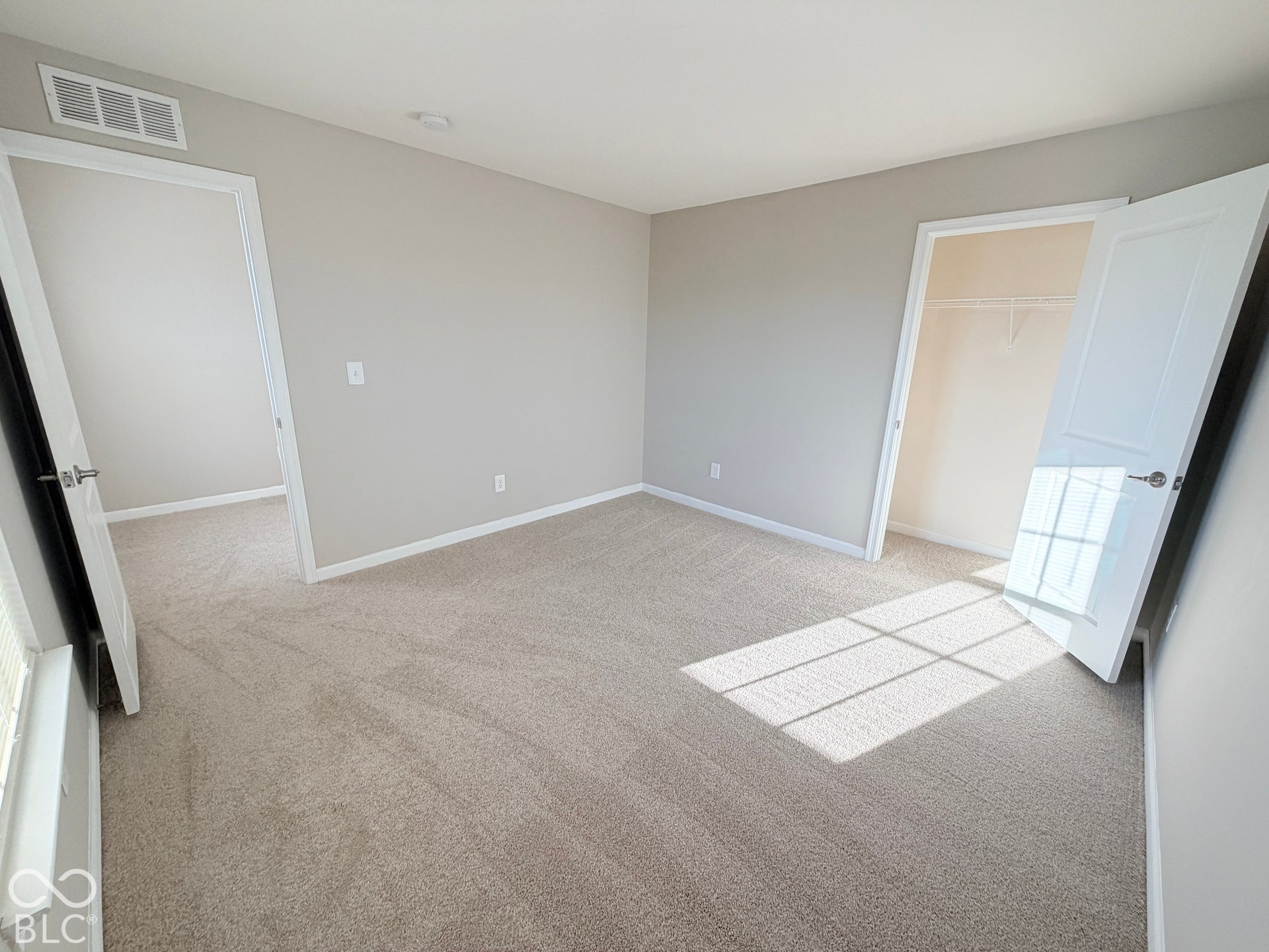 652 Classic Lane, Greenwood, IN 46143 Neutral tone wall finishes, carpeting, recessed lighting, and a built-in closet with shelving