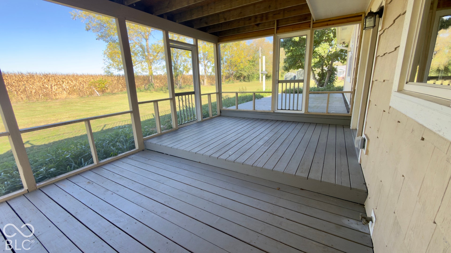 4034 W State Road 135 W, Trafalgar, IN 46181 Screened porch with painted wood-finish flooring