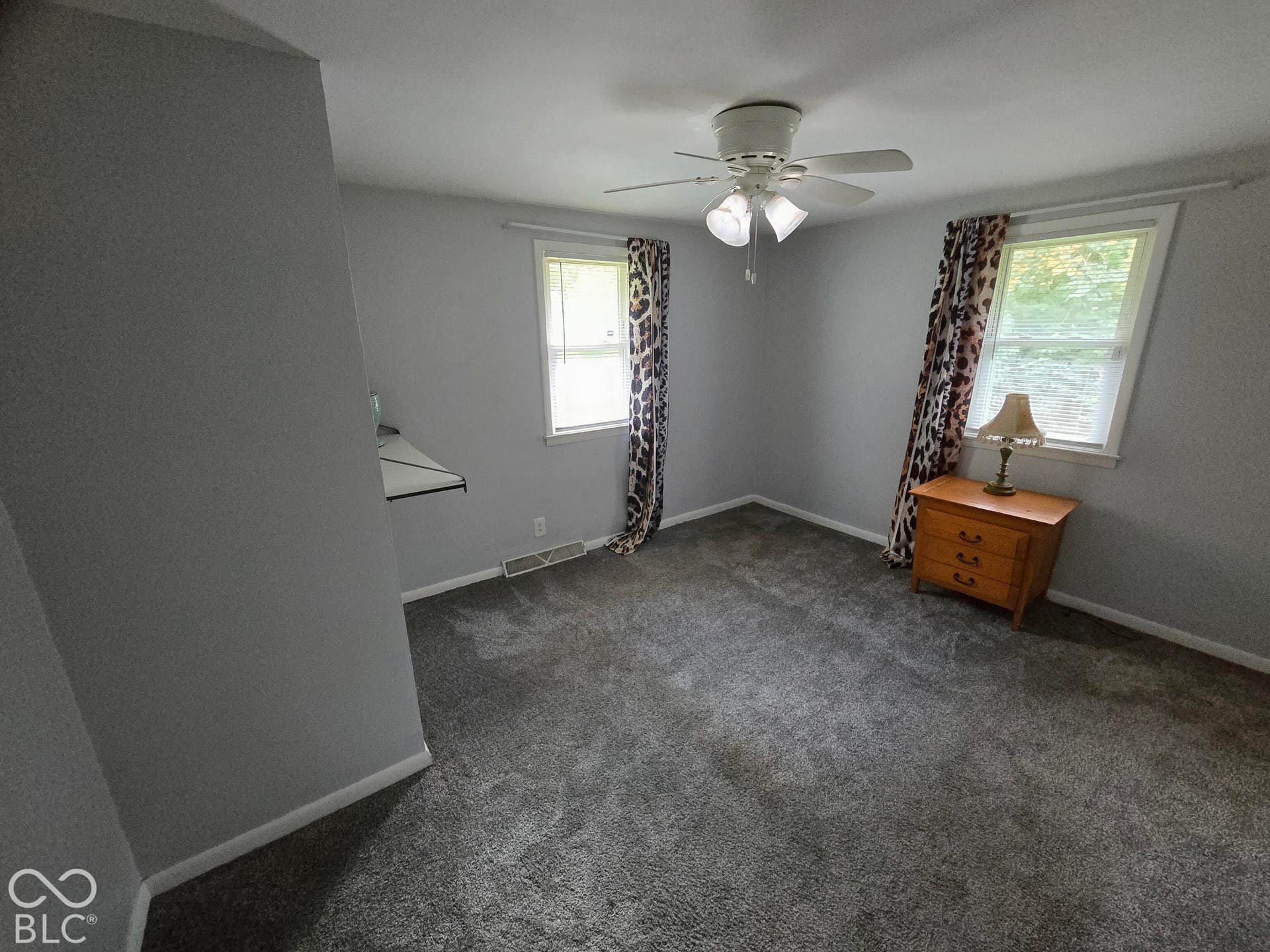 6720 S County Road 800 W, Daleville, IN 47334 Gray carpeting, neutral wall finishes, and a ceiling fan with integrated lighting