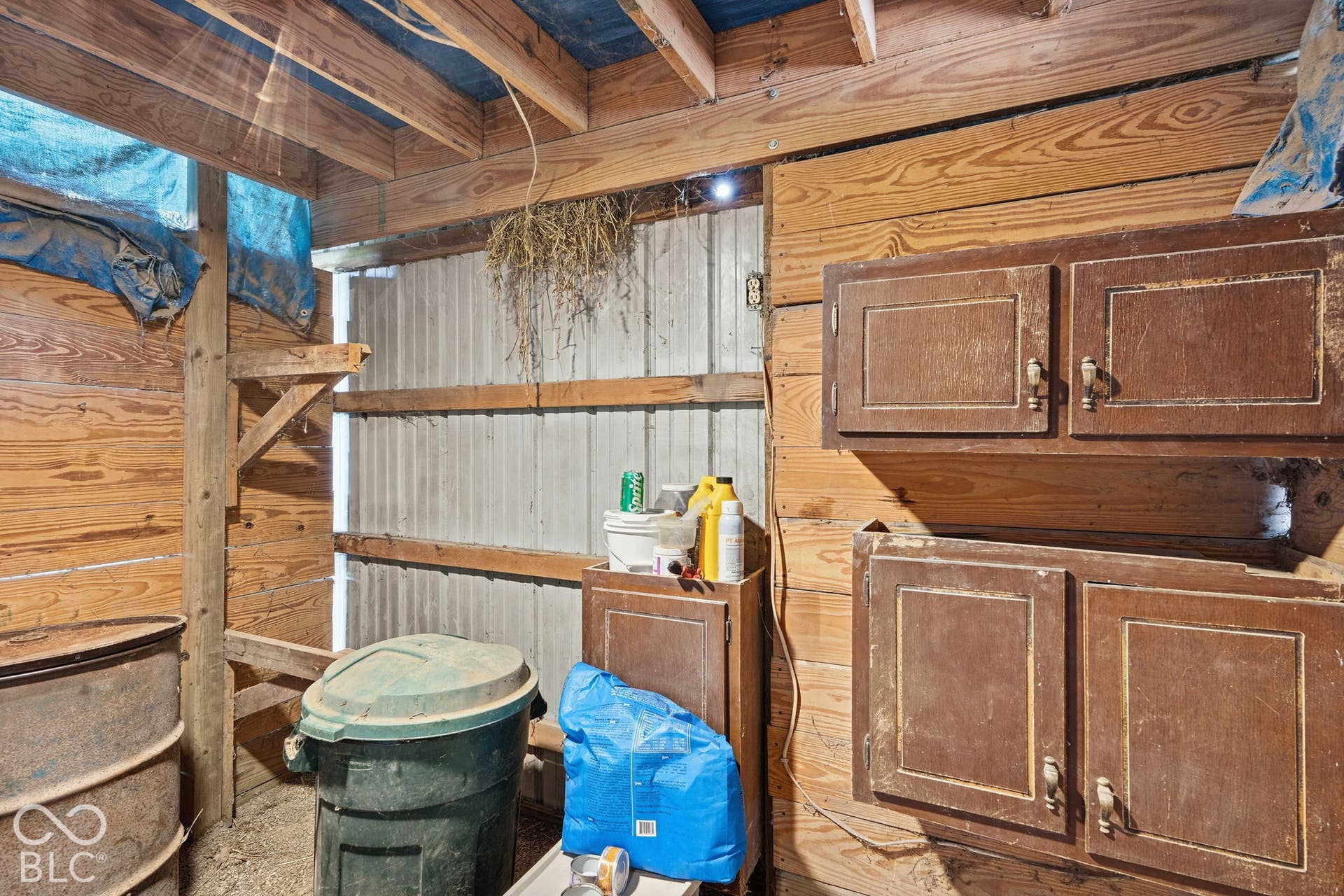 4937 E Edgewood, Indianapolis, IN 46237 The tack room in the barn offers storage keeps feed, tack and horse supplies organized and close to the stalls.