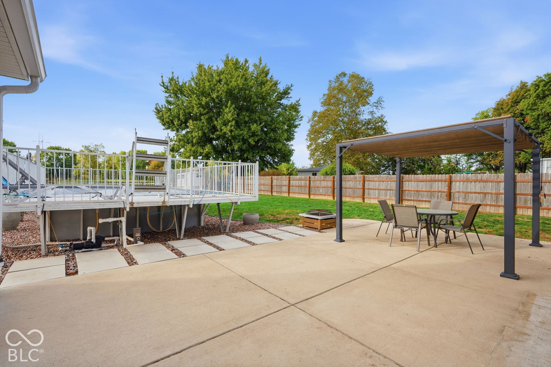 4937 E Edgewood, Indianapolis, IN 46237 Spacious and meticulously maintained patio with beautiful landscaping that welcome you into the backyard.