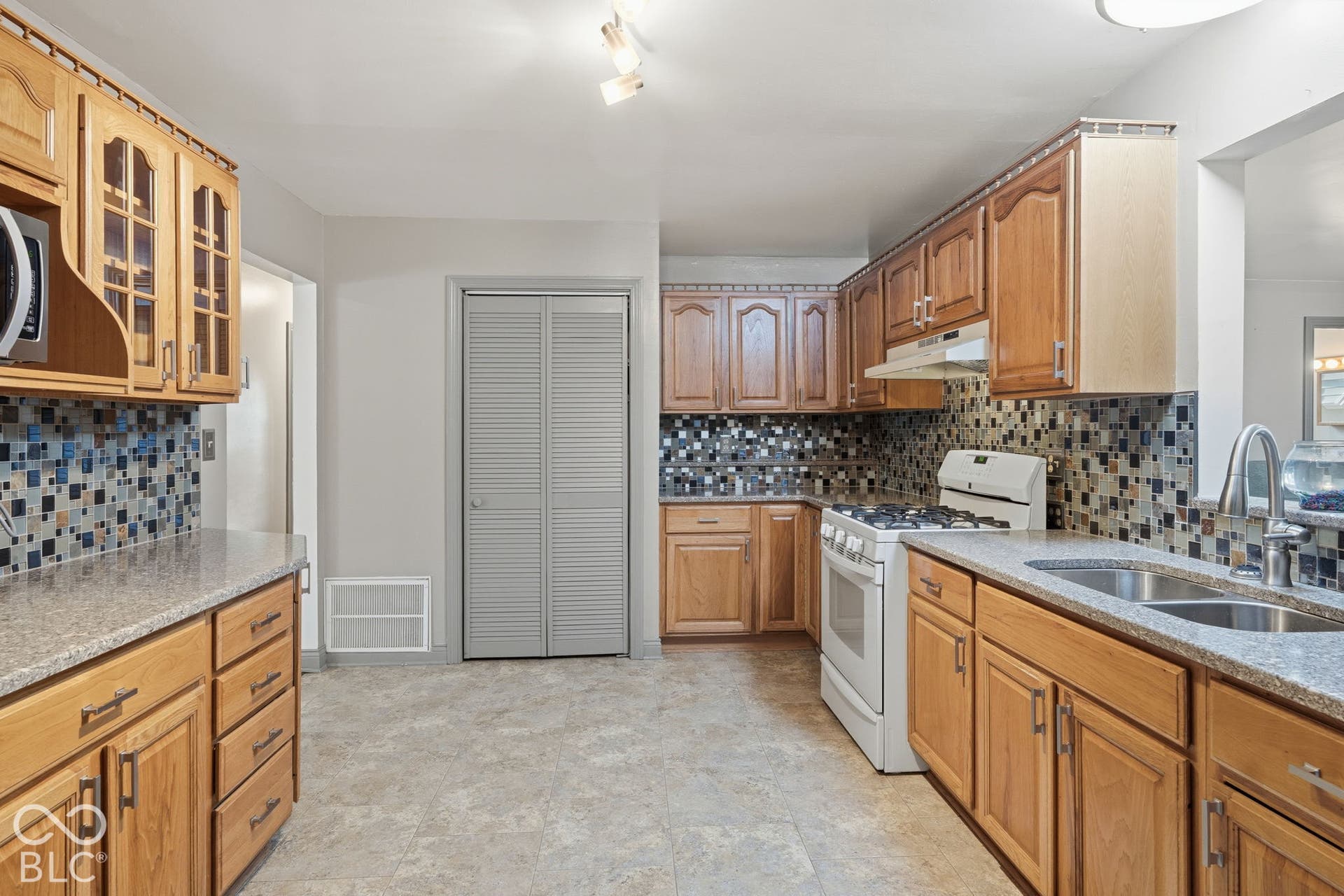 4937 E Edgewood, Indianapolis, IN 46237 An updated kitchen at the heart of a property offering the best of both worlds: Indianapolis convenience with space for horses, a barn, and nearly 2 acres.