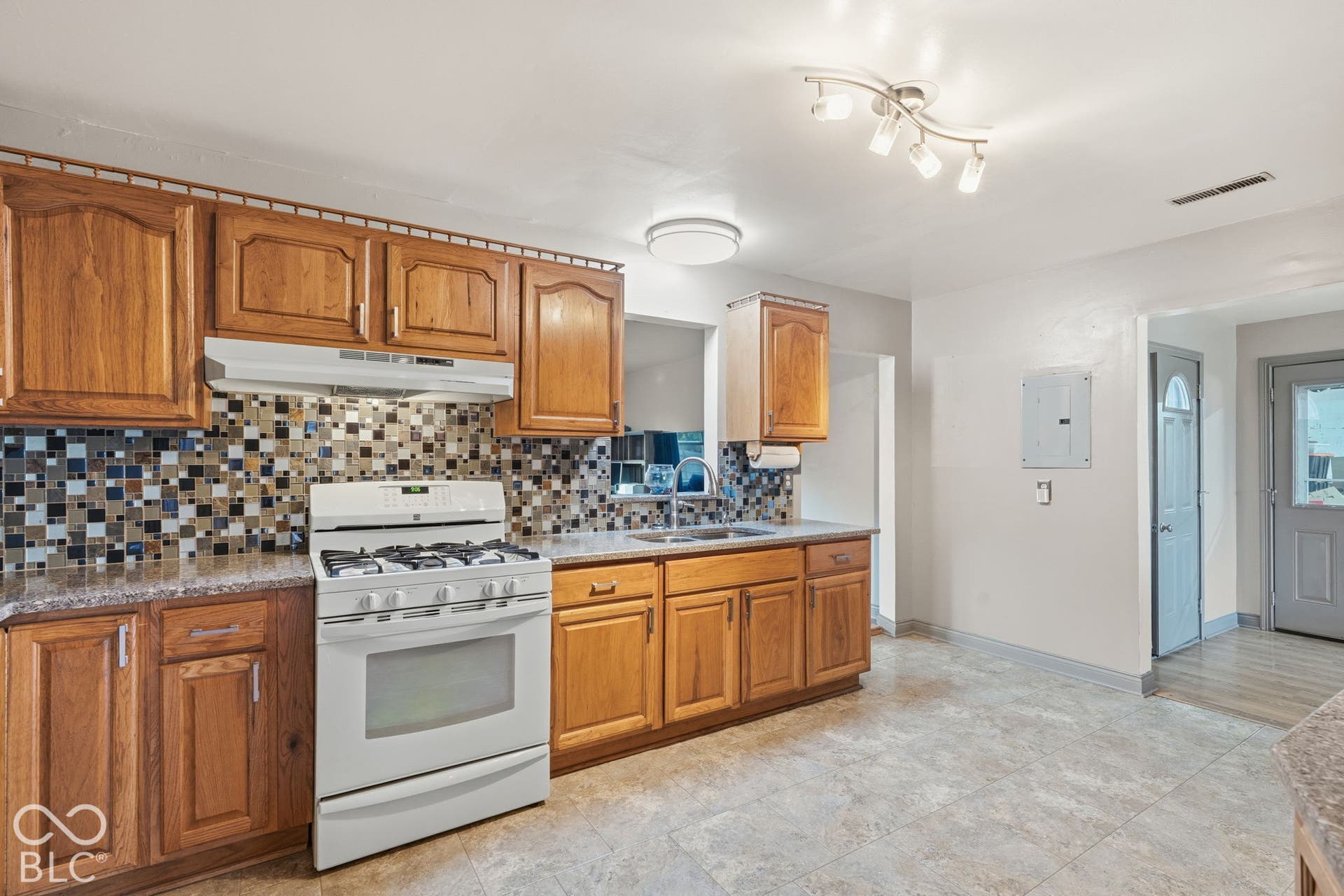 4937 E Edgewood, Indianapolis, IN 46237 Updated kitchen with generous cabinetry, countertops, and backsplash, all part of a home that pairs comfortable everyday living with true horse-property amenities.
