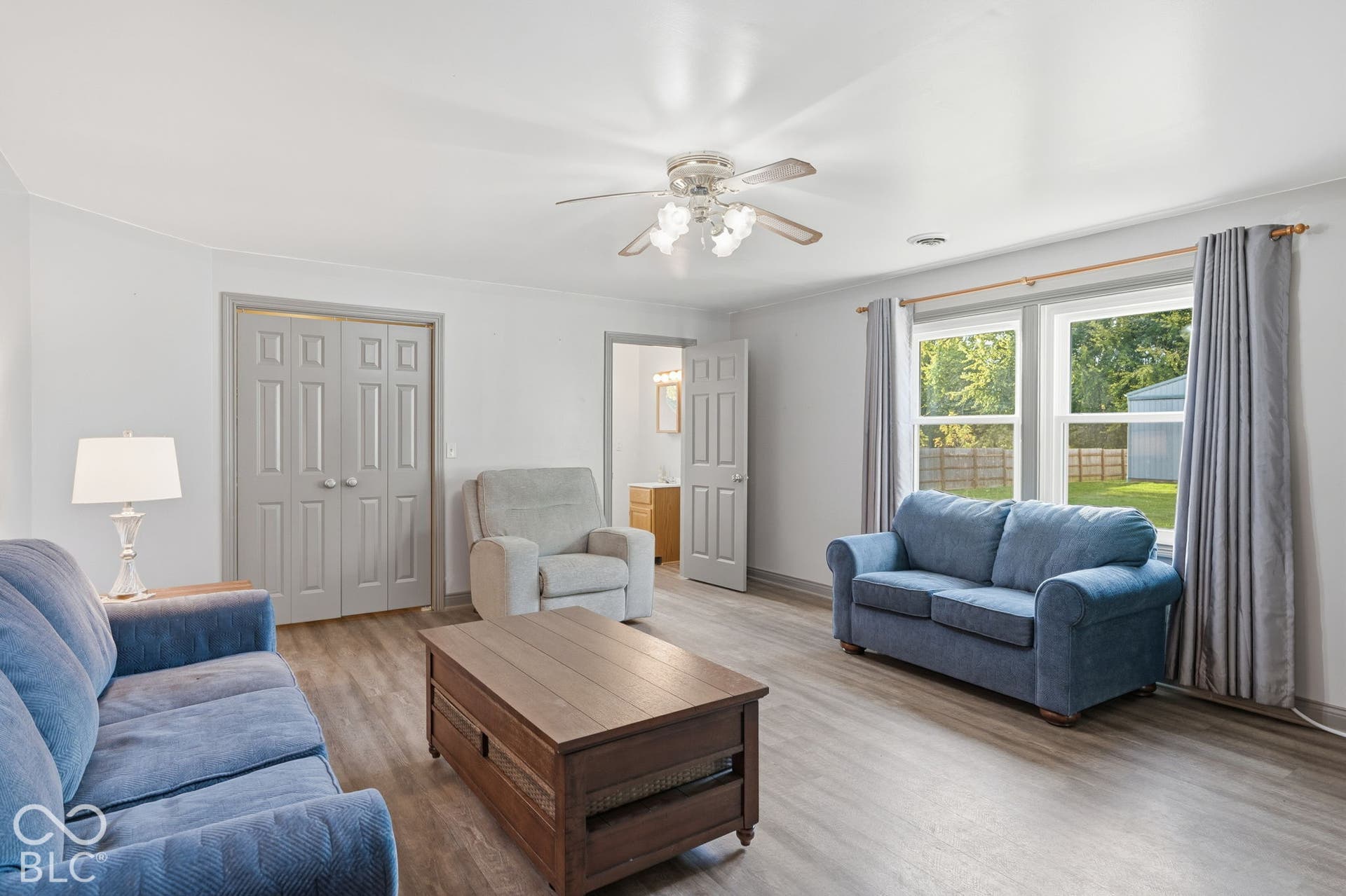 4937 E Edgewood, Indianapolis, IN 46237 Spacious living area overlooking the property, where fully fenced acreage, a 3-stall horse barn, tack room, hayloft, and above-ground pool make outdoor living the real showstopper.