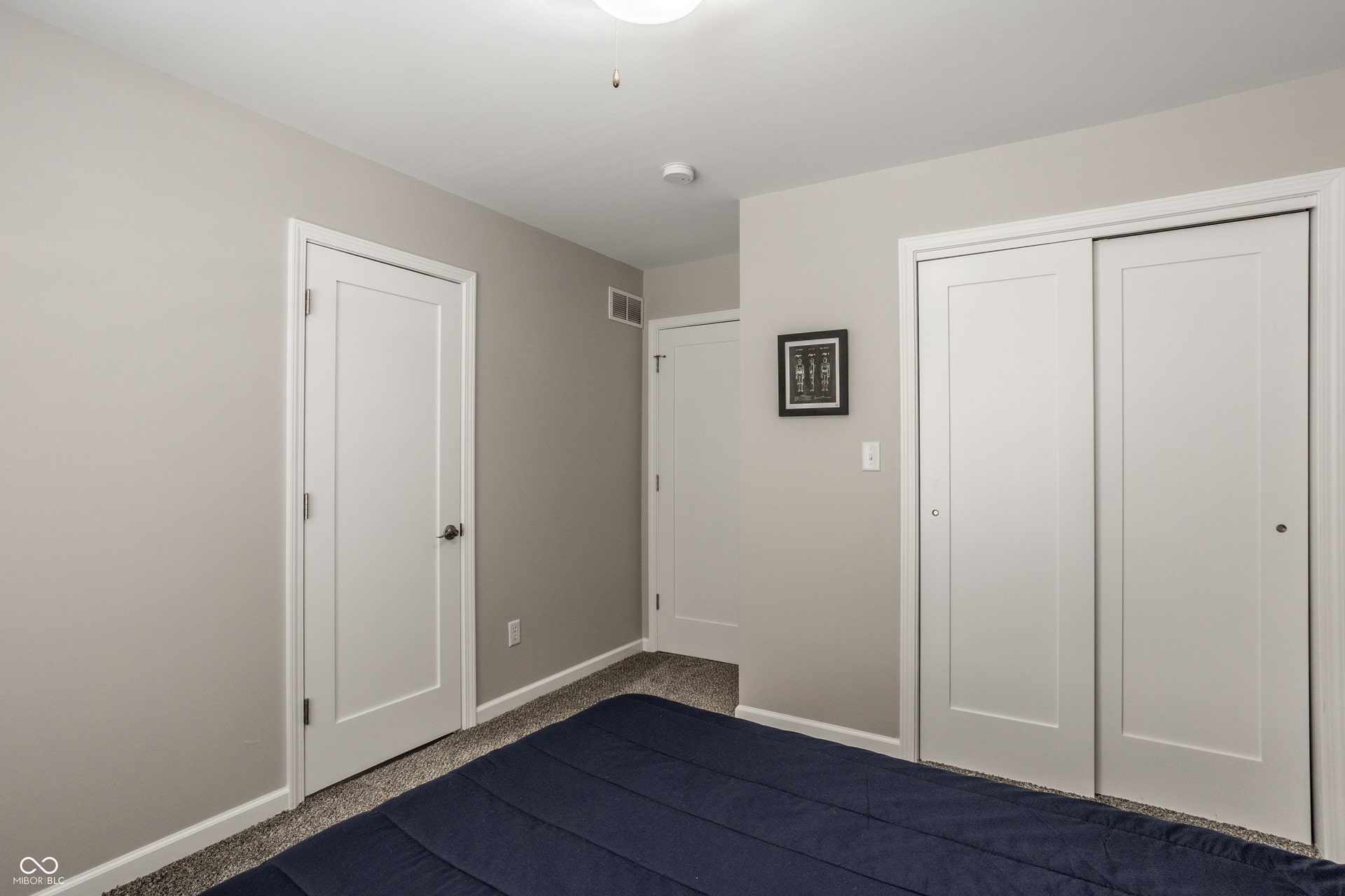 2323 E 57th Street, Indianapolis, IN 46220 Neutral gray wall paint, white trim, and white interior doors