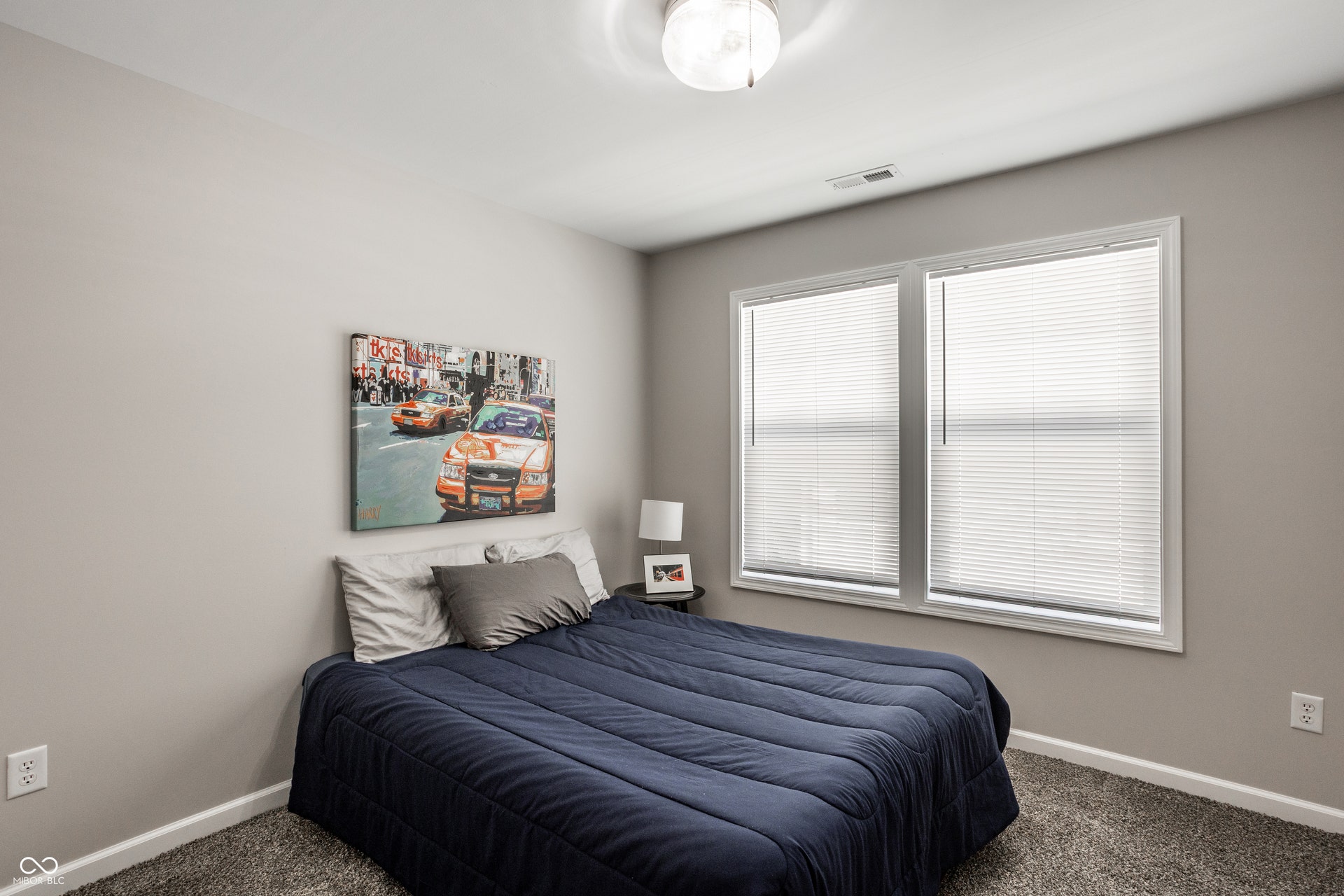 2323 E 57th Street, Indianapolis, IN 46220 Neutral wall color, dual windows with blinds, flush mount ceiling light, and carpeted flooring